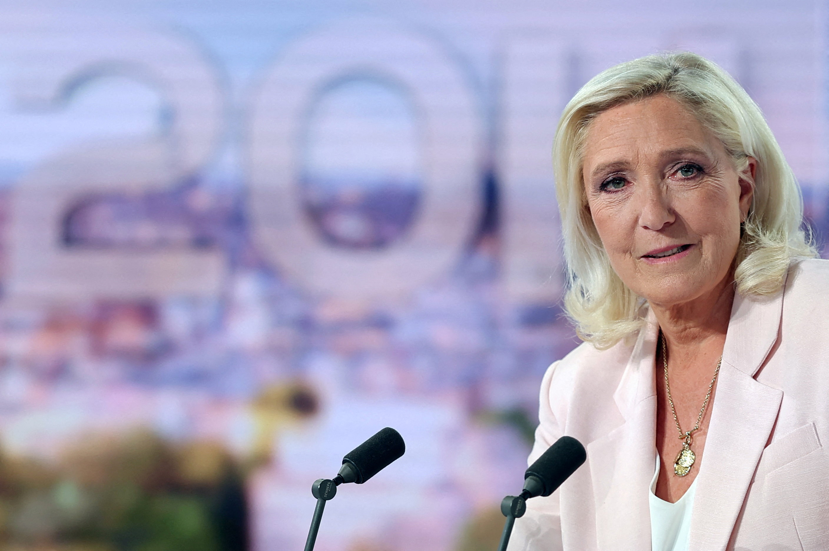 President of the far-right Rassemblement National (RN) parliamentary group Marine Le Pen poses prior to an interview on the evening news broadcast of French TV channel TF1 following the verdict in her appeal trial over misuse of EU funds, in Boulogne-Billancourt, outside Paris, on July 7, 2026.