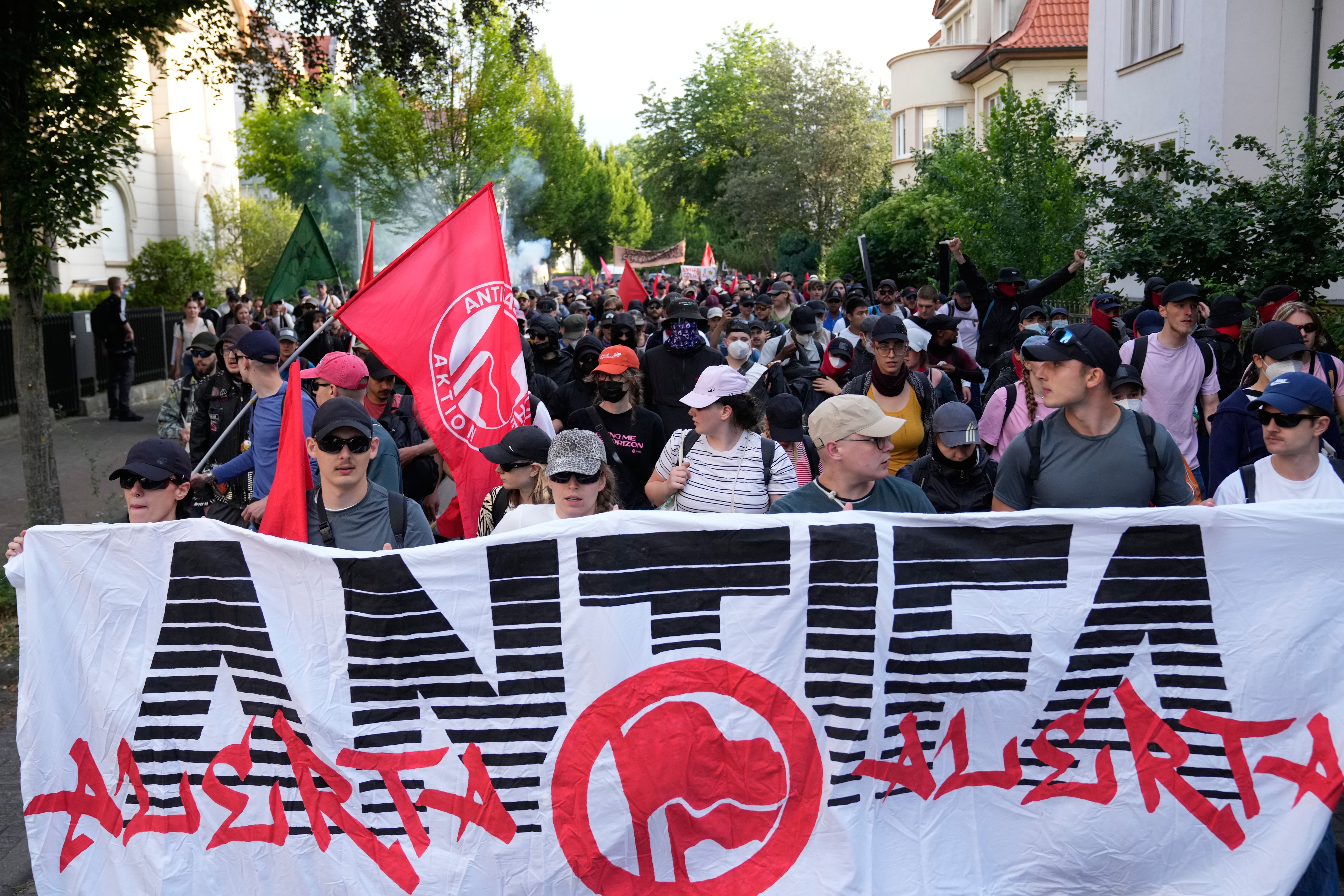 Protesters gather before a party convention of Alternative for Germany, or AfD in Erfurt, Germany, Saturday, July 4, 2026. (AP Photo/Ebrahim Noroozi)