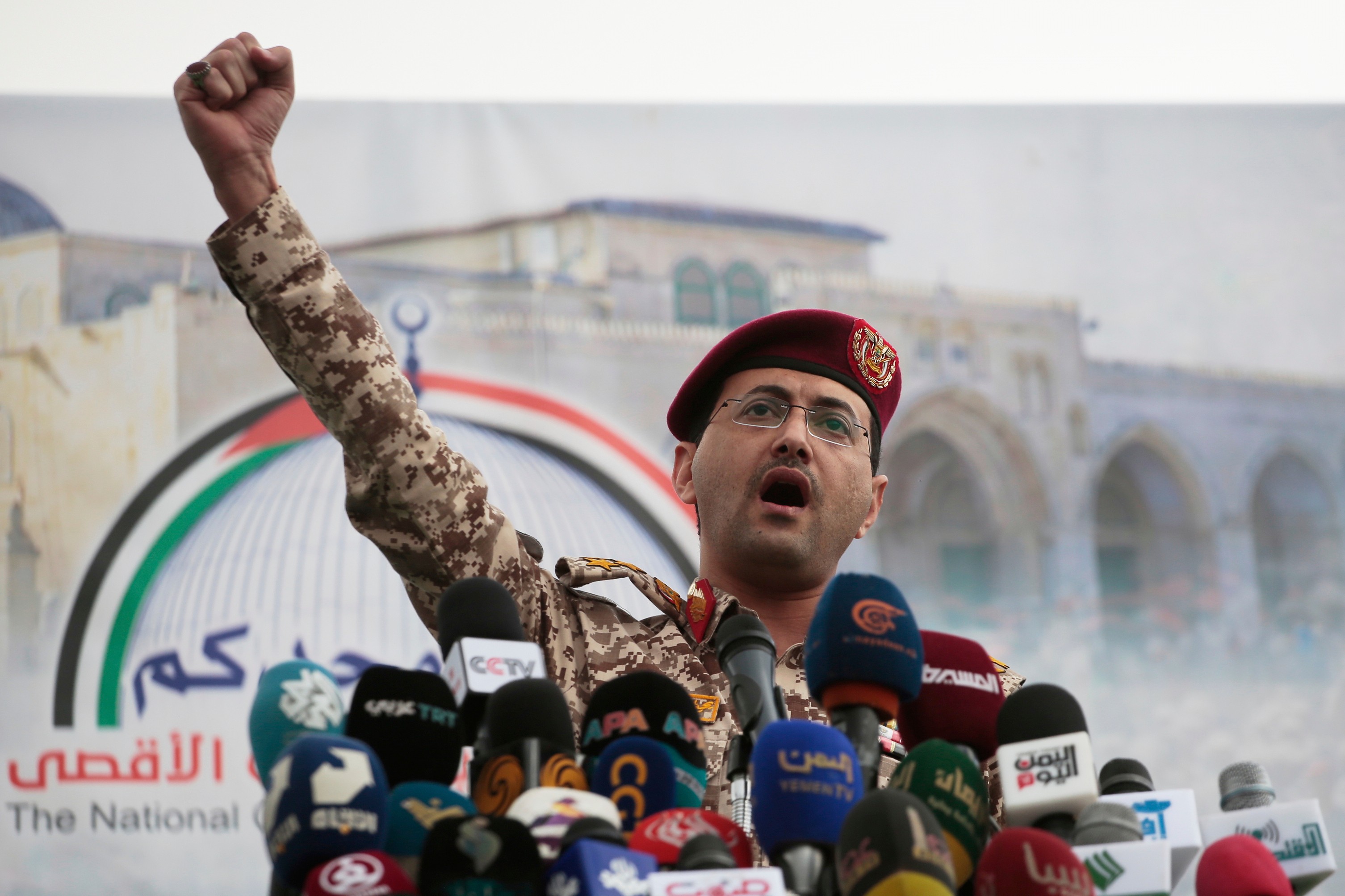 FILE - Houthi military spokesman Yahya Saree speaks at a rally against the U.S. and Israel in Sanaa, Yemen, April 18, 2025. (AP Photo/Osamah Abdulrahman, File)