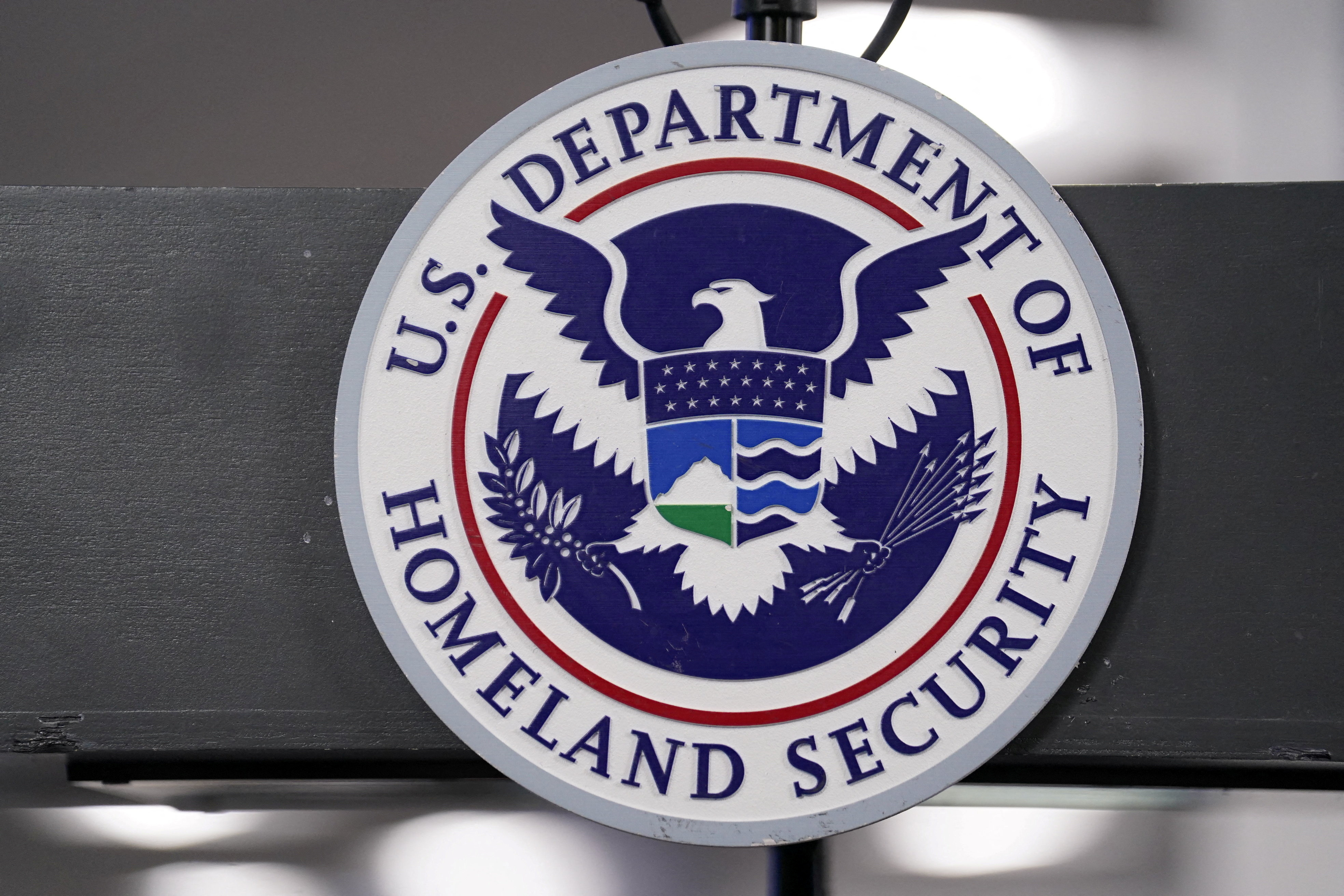 FILE PHOTO: The U.S. Department of Homeland Security seal is displayed ahead of an expected press conference at the FEMA National Response Coordination Center in Washington, D.C., U.S., January 24, 2026. REUTERS/Nathan Howard./File Photo