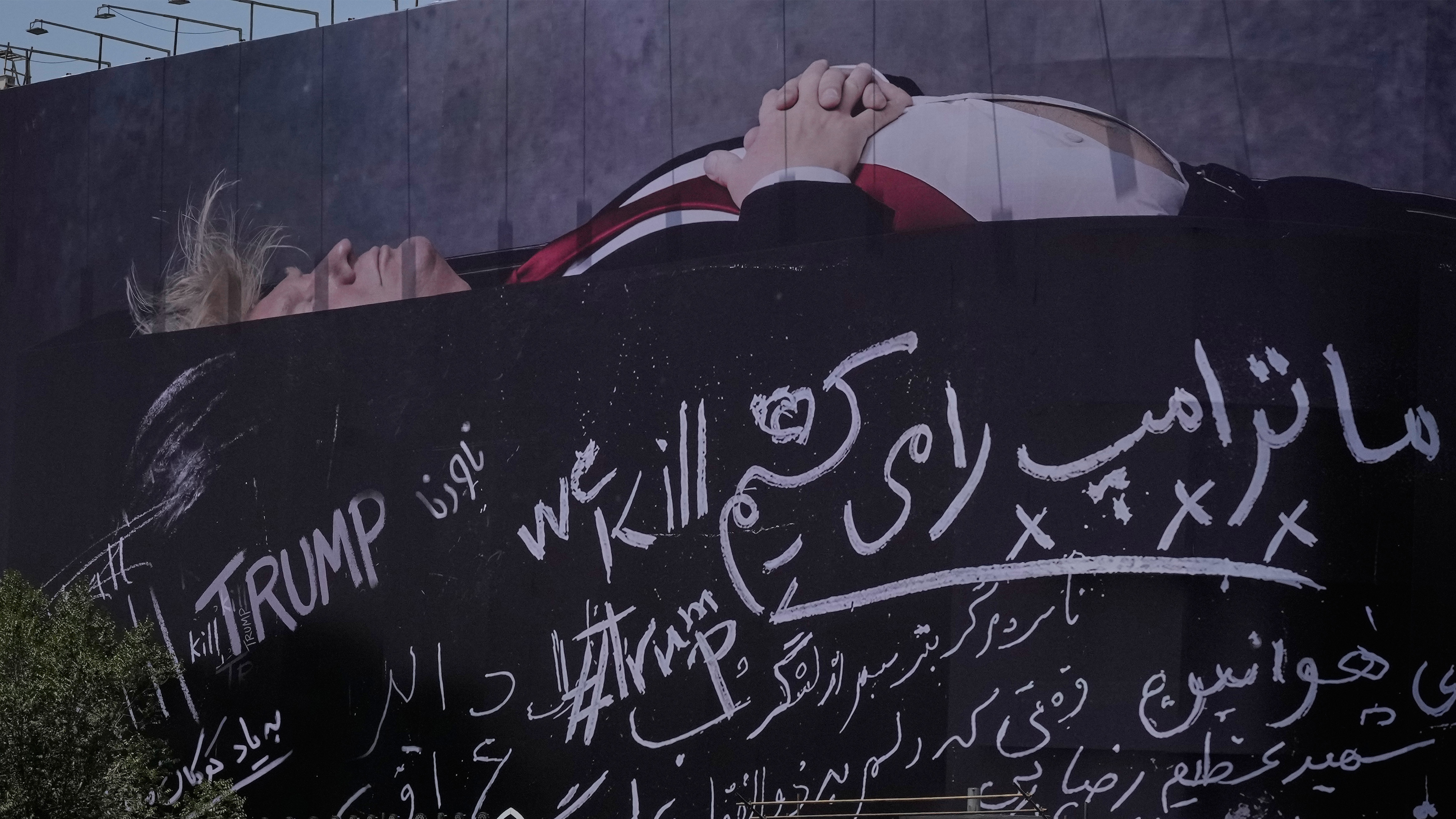Iran has installed a billboard in the capital Tehran showing US President Donald Trump lying in a coffin. A statue nearby depicts the fist of late Supreme Leader Ayatollah Ali Khamenei, who was assassinated at the start of the US-Israeli war on Iran.