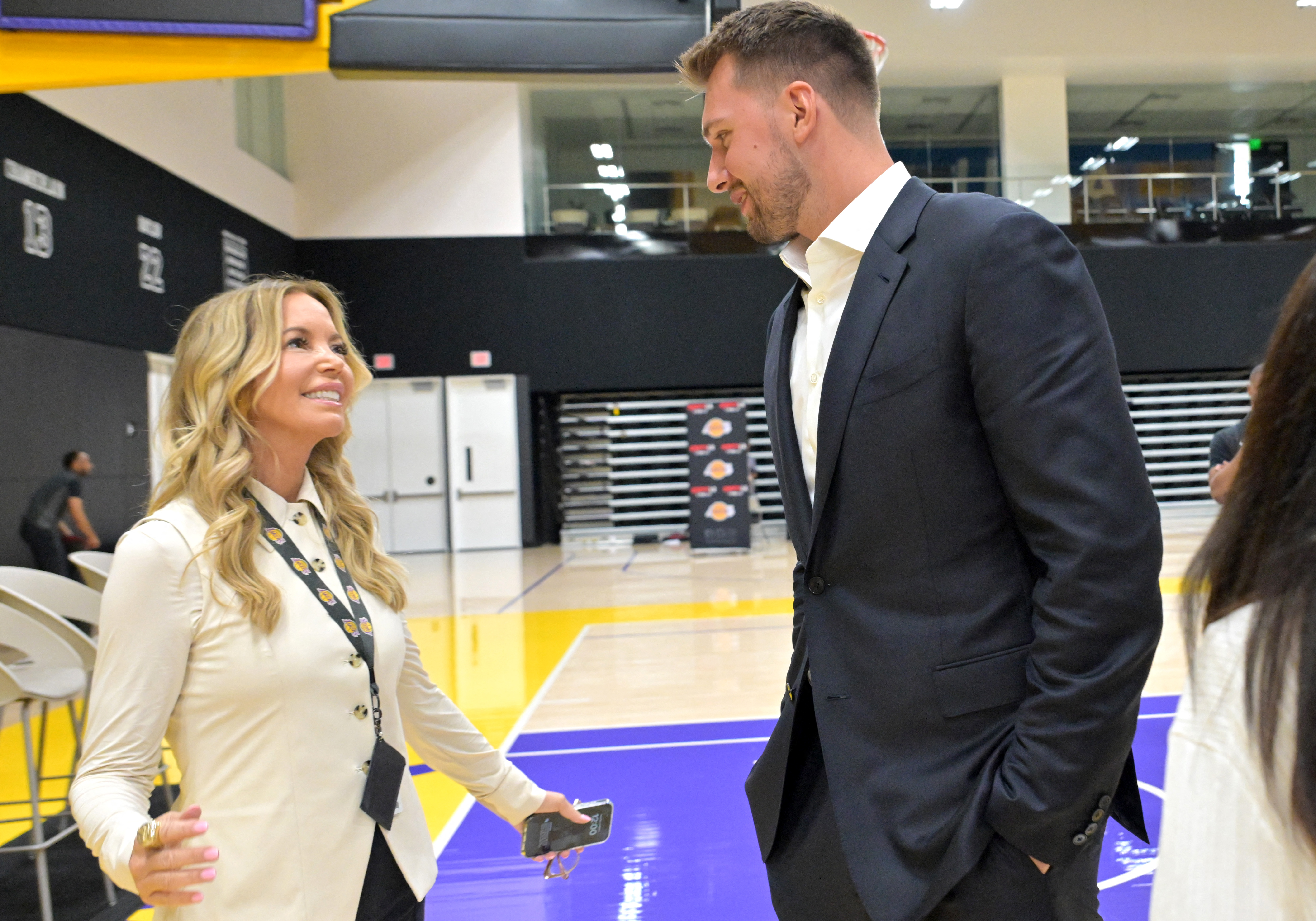 Jeanie Buss and Luka Doncic react.