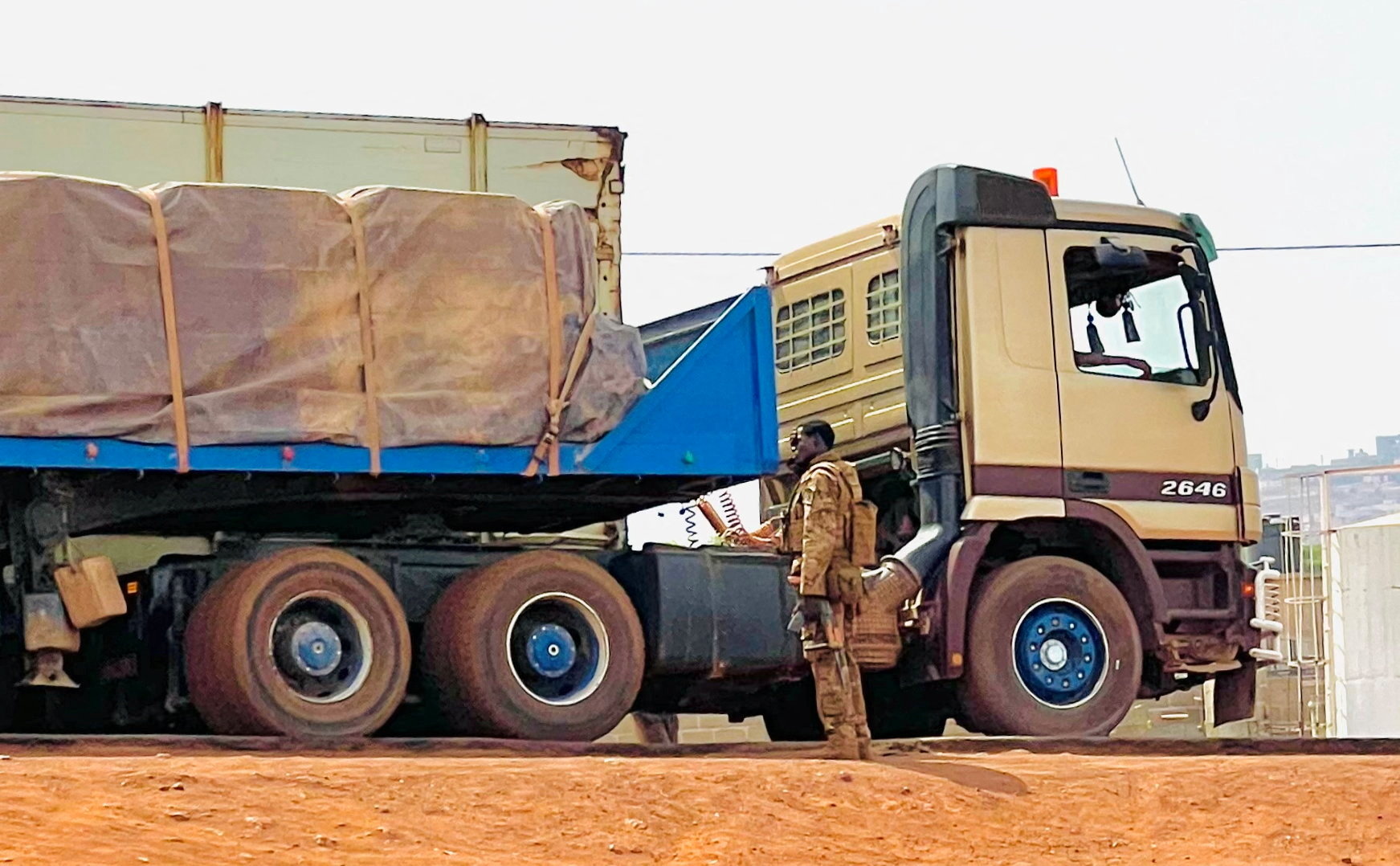A Malian soldier stands near a truck during a patrol following the attack on Mali's main military base Kati, outside the capital Bamako, in Kati, Mali, April 27, 2026 [Stringer/Reuters]