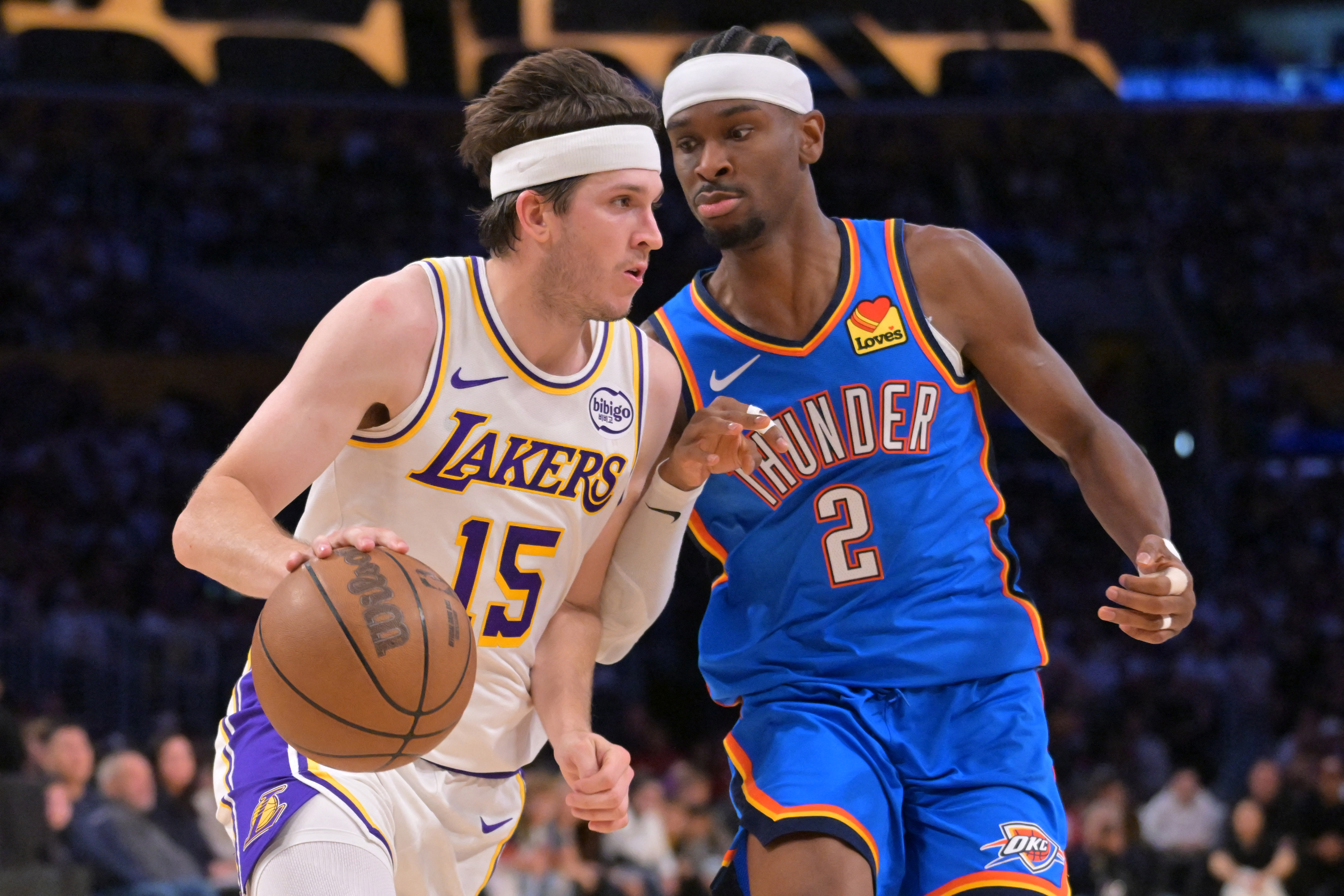 Los Angeles Lakers guard Austin Reaves, left, just re-signed with the Lakers on a four-year, $185m maximum contract extension last month
