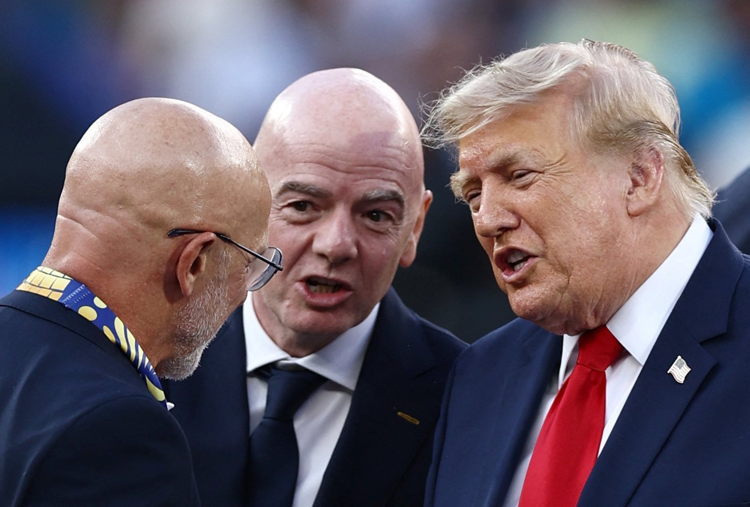 IFA President Gianni Infantino and U.S. President Donald Trump speak with Spain coach Luis de la Fuente