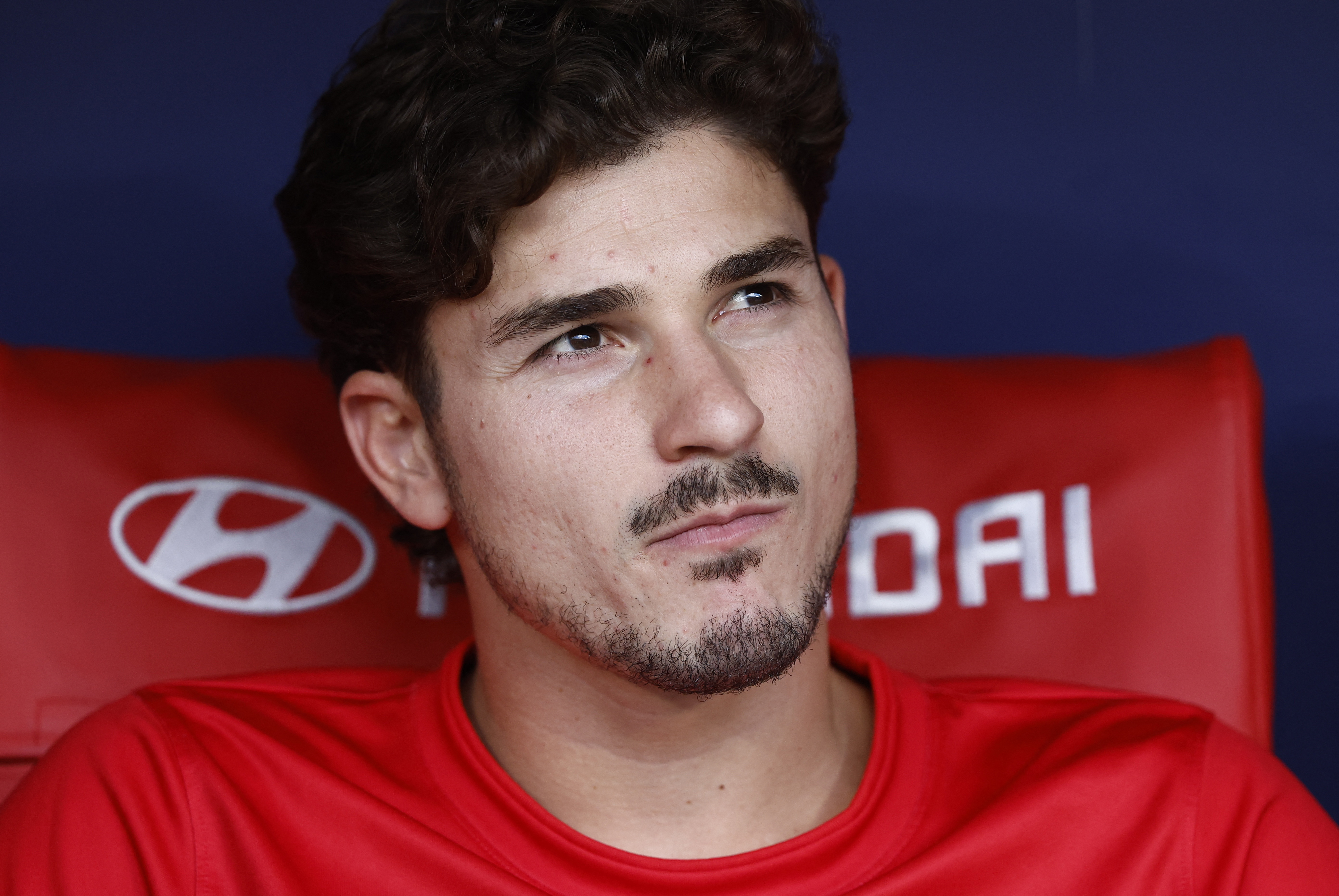 Atletico Madrid's Julian Alvarez on the bench before a match.