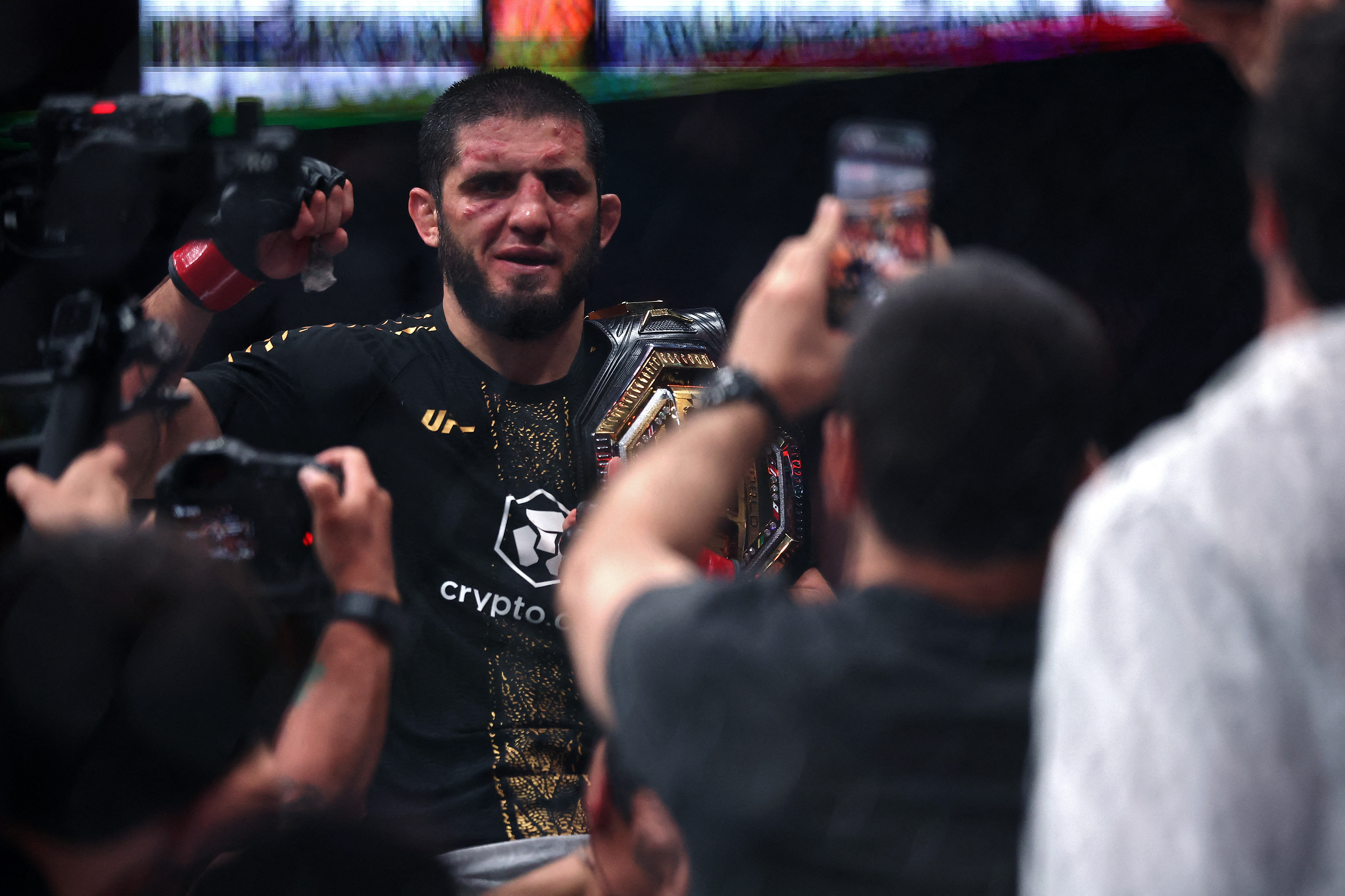 Makhachev celebrates after defeating Machado Garry
