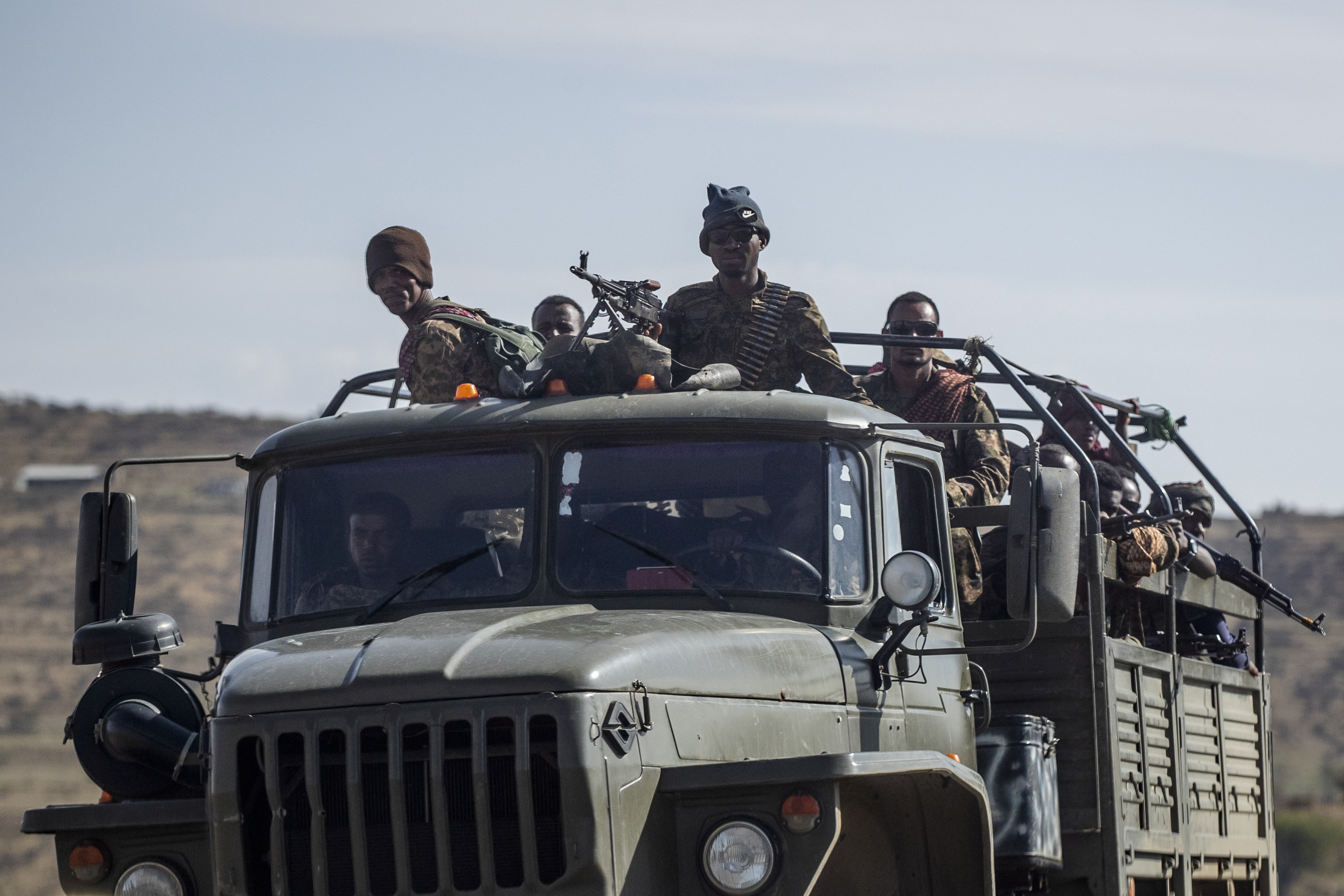 Ethiopian government soldiers ride in the back of a truck near Agula, north of Mekele in the Tigray region, on May 8, 2021. [Ben Curtis/AP]