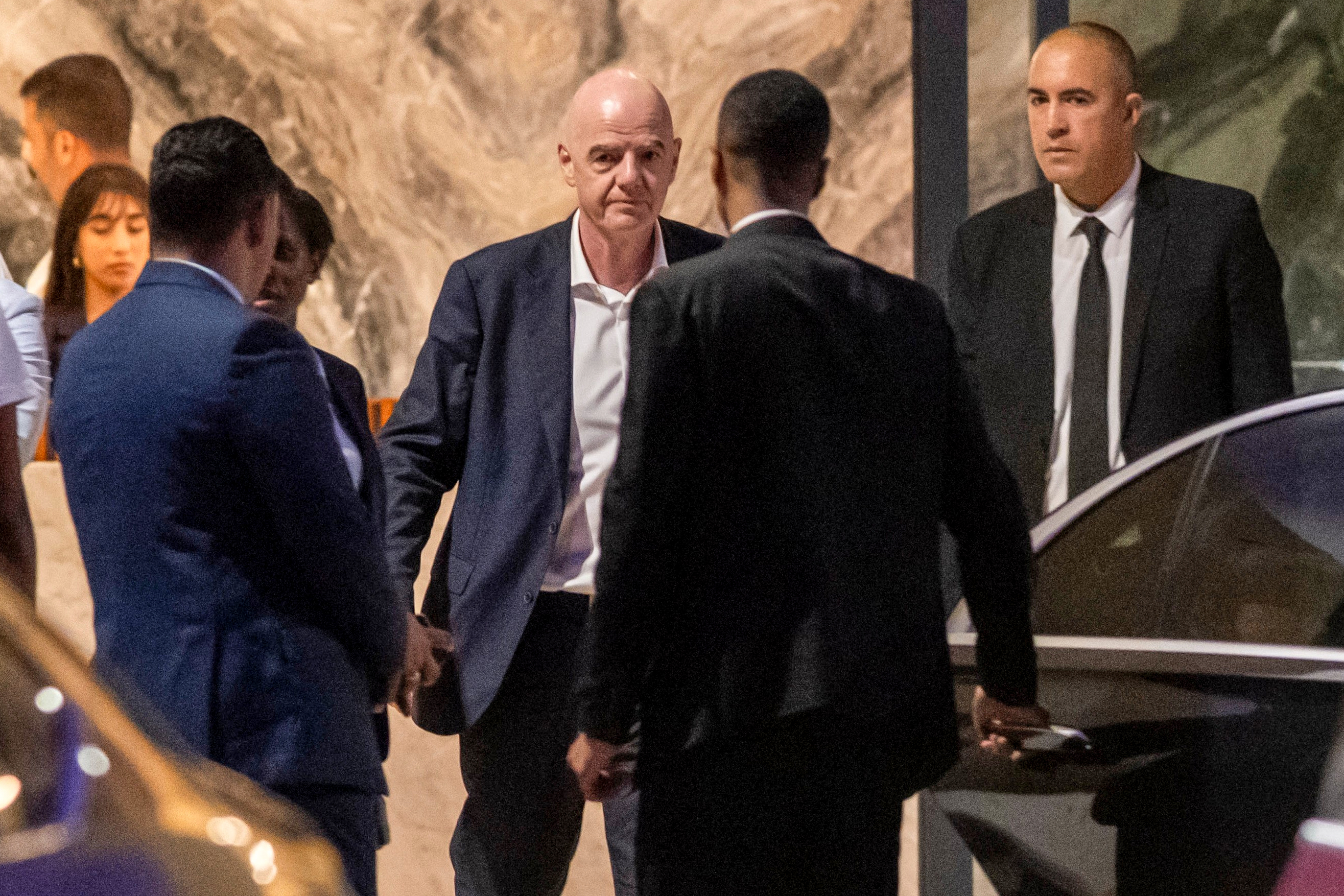 FIFA president Gianni Infantino leaves after attending a Women AFCON 2026 soccer match between Malawi and Zambia