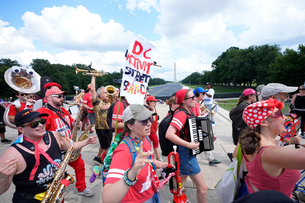 a group of protesters in Washington DC