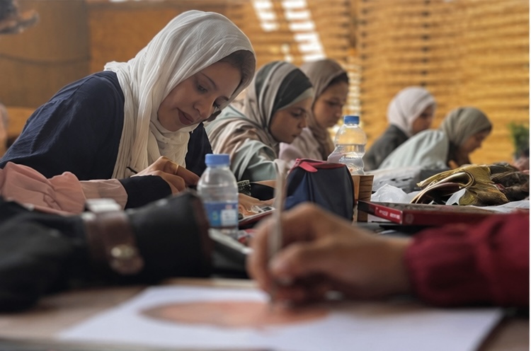 Young women drawing