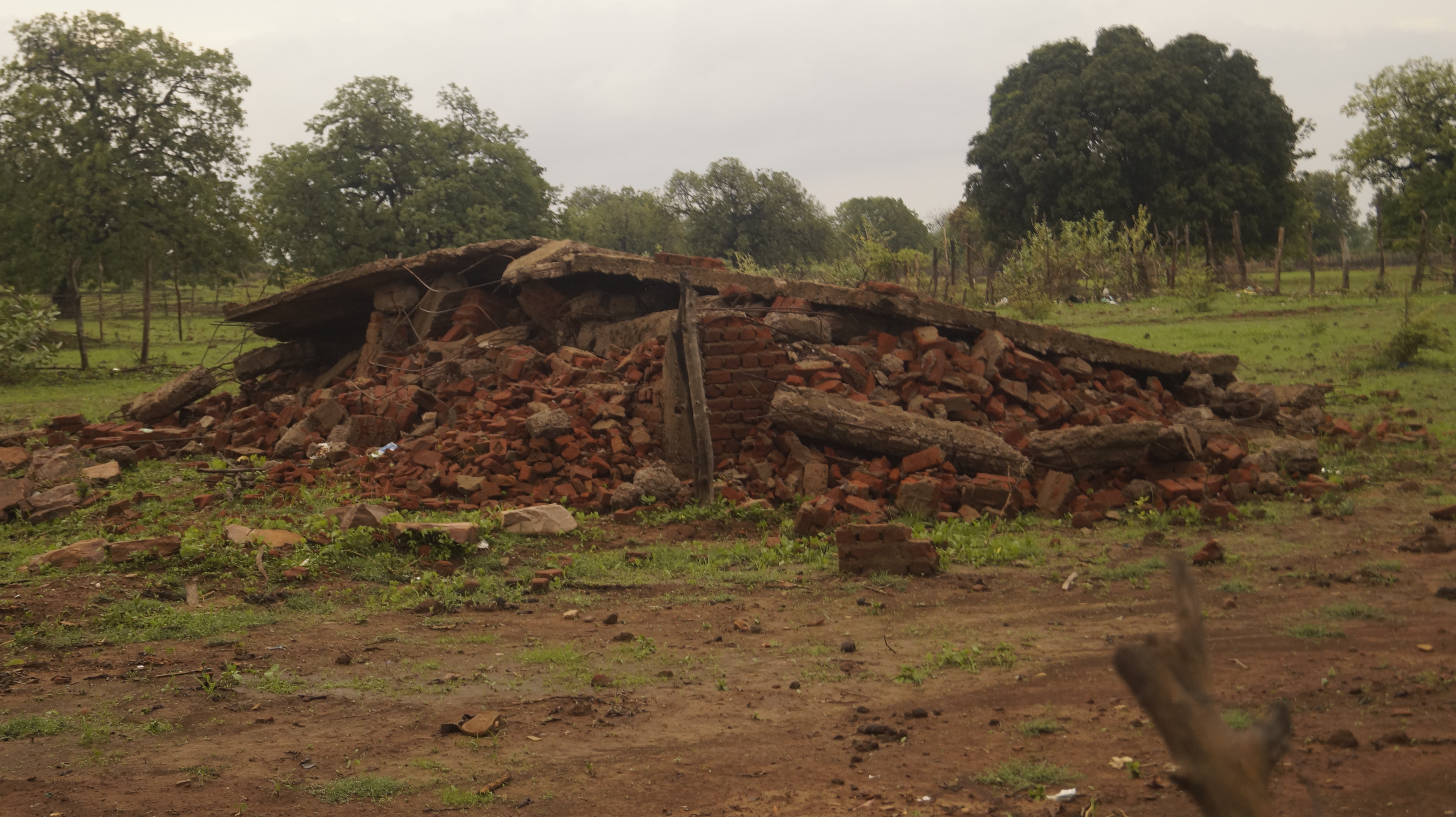 The remains of one of the two homes occupied by Pooja Gond’s family in Pathapur village