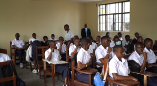 Pupils attend classes in Goma, Democratic Republic of the Congo, as the country begins a new school year amid an Ebola outbreak [Prosper Heri/Al Jazeera]