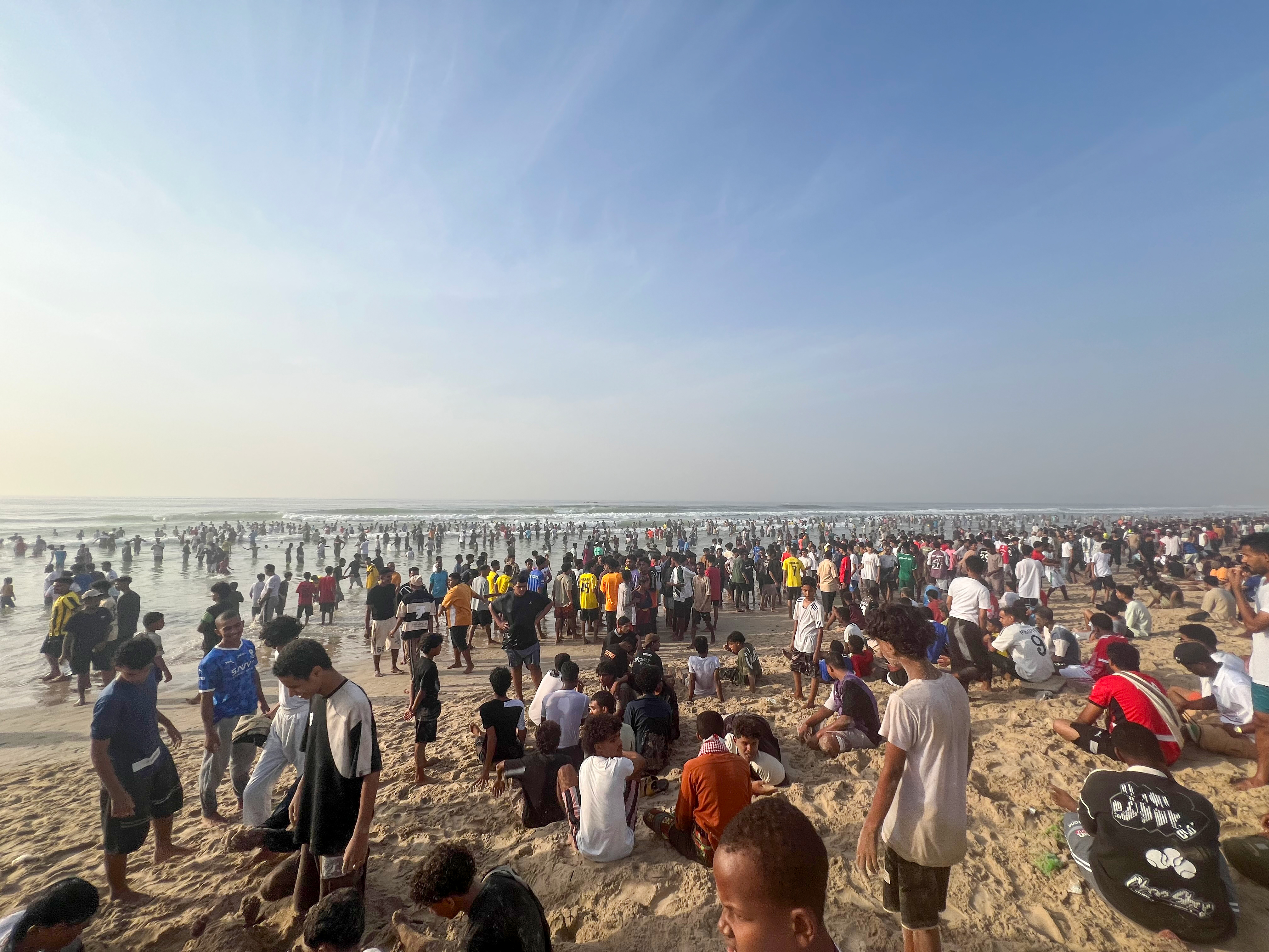 Thousands of visitors flock to Mukalla's cood waters during the annual Al-Baldah season. [Saeed Al-Batati/Al Jazeera]