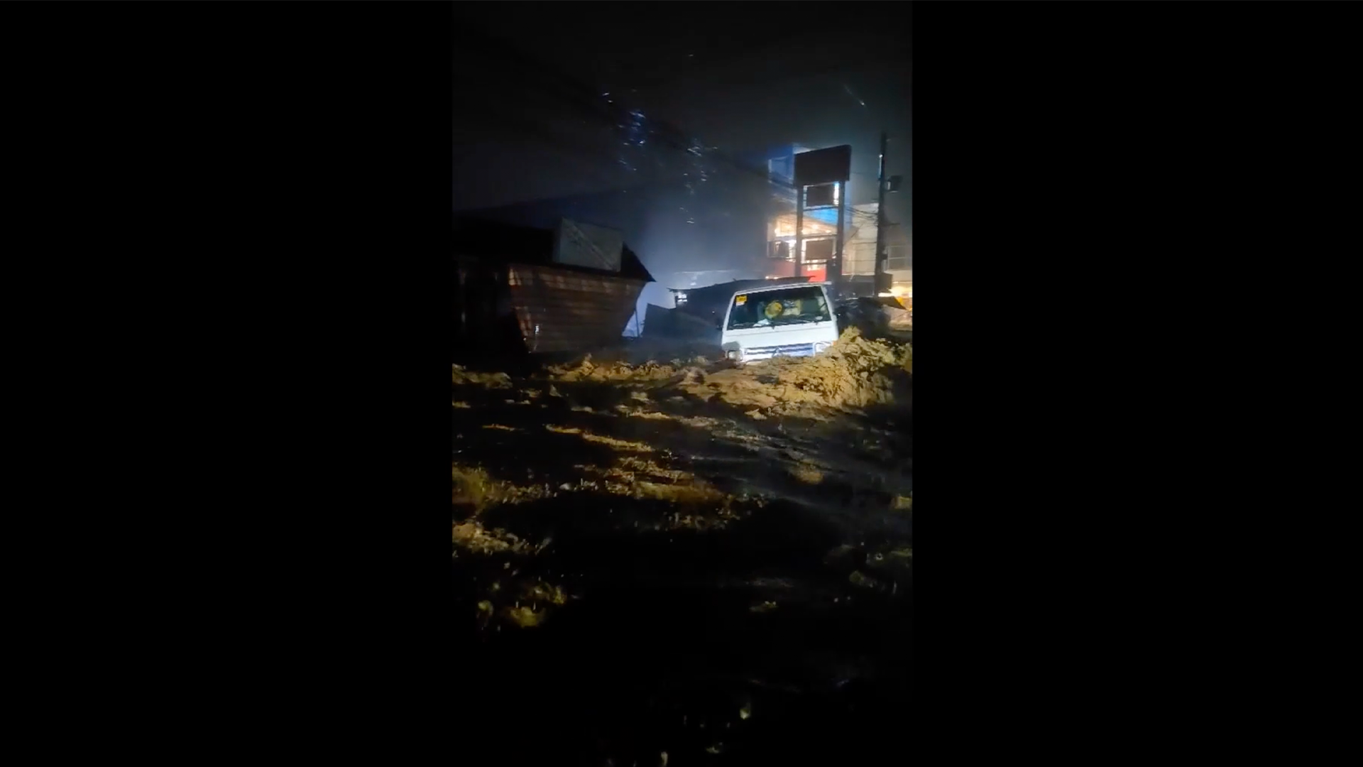 Raging floodwaters sweep away lorry in the Philippines