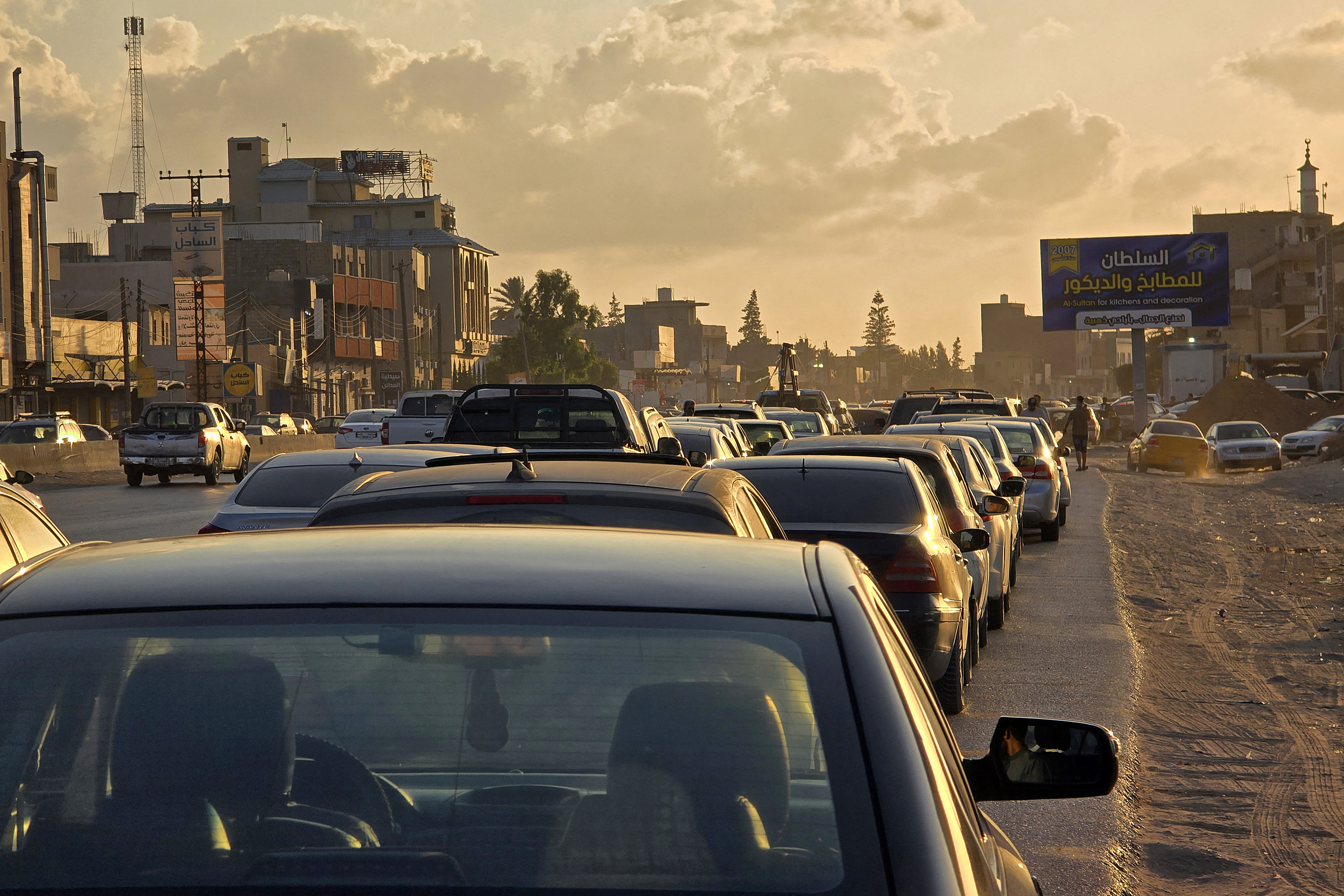 Vehicles wait in a long queue to top up fuel in the eastern outskirts of Libya’s capital Tripoli on August 20, 2026 [AFP]
