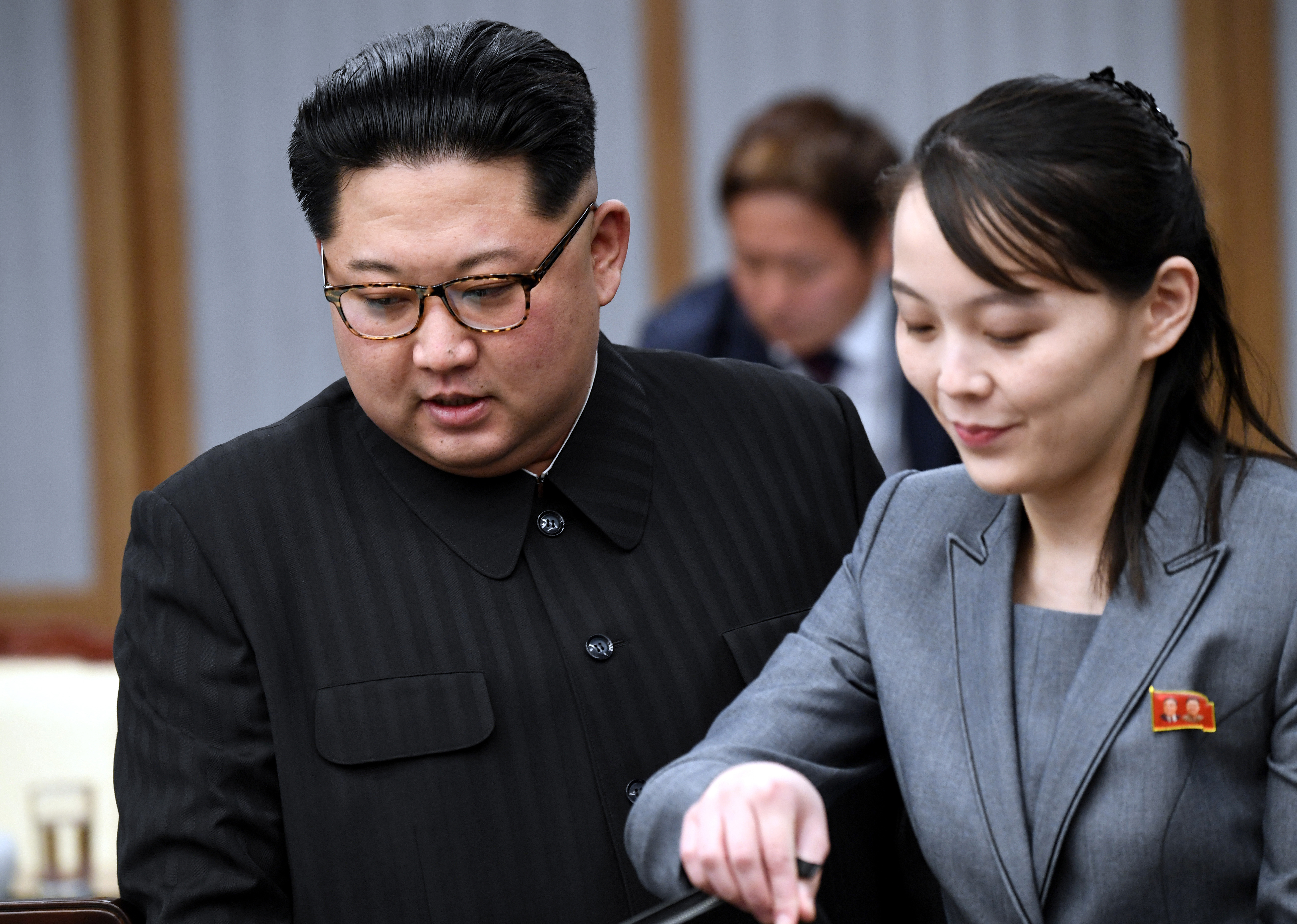 PANMUNJOM, SOUTH KOREA - APRIL 27: North Koraen Leader Kim Jong Un (L) and sister Kim Yo Jong attend the Inter-Korean Summit at the Peace House on April 27, 2018 in Panmunjom, South Korea. Kim and Moon meet at the border today for the third-ever inter-Korean summit talks after the 1945 division of the peninsula, and first since 2007 between then President Roh Moo-hyun of South Korea and Leader Kim Jong-il of North Korea. (Photo by Korea Summit Press Pool/Getty Images)