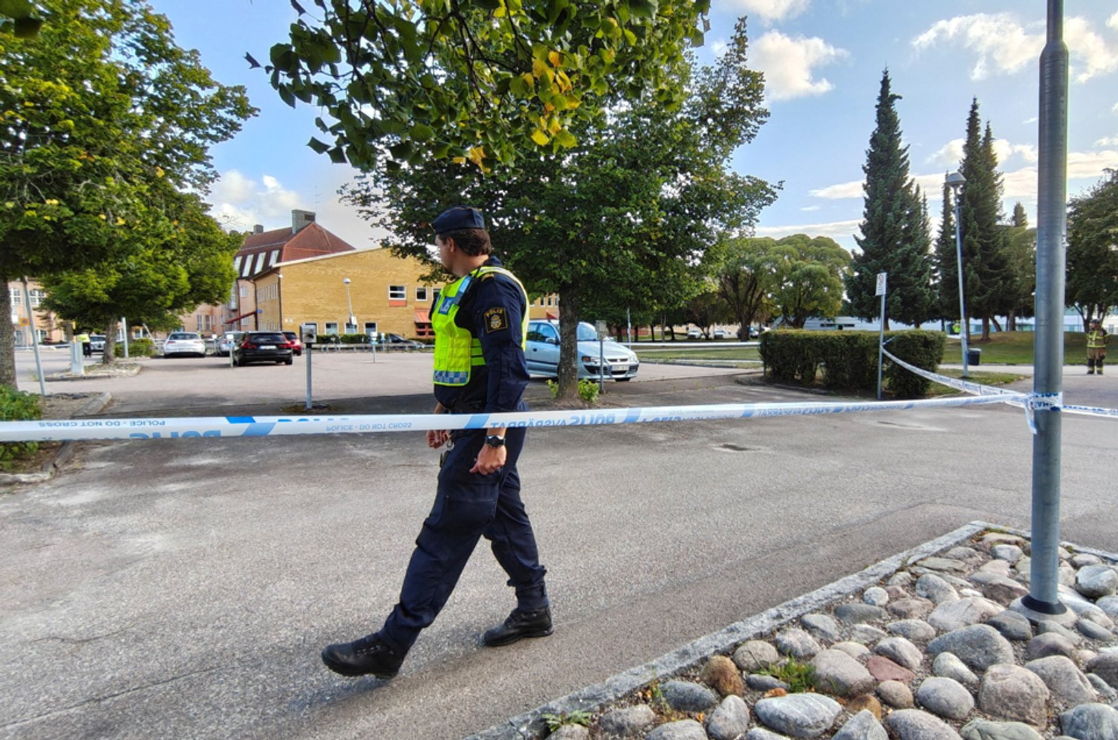 Police officer secures the site where several people were injured at a Swedish high school by a person armed with a sword, according to the officials of the Fagersta municipality, at Brinell School in Fagersta, central Sweden, August 21, 2026. REUTERS/Philip O&rsquo;Connor TPX IMAGES OF THE DAY
