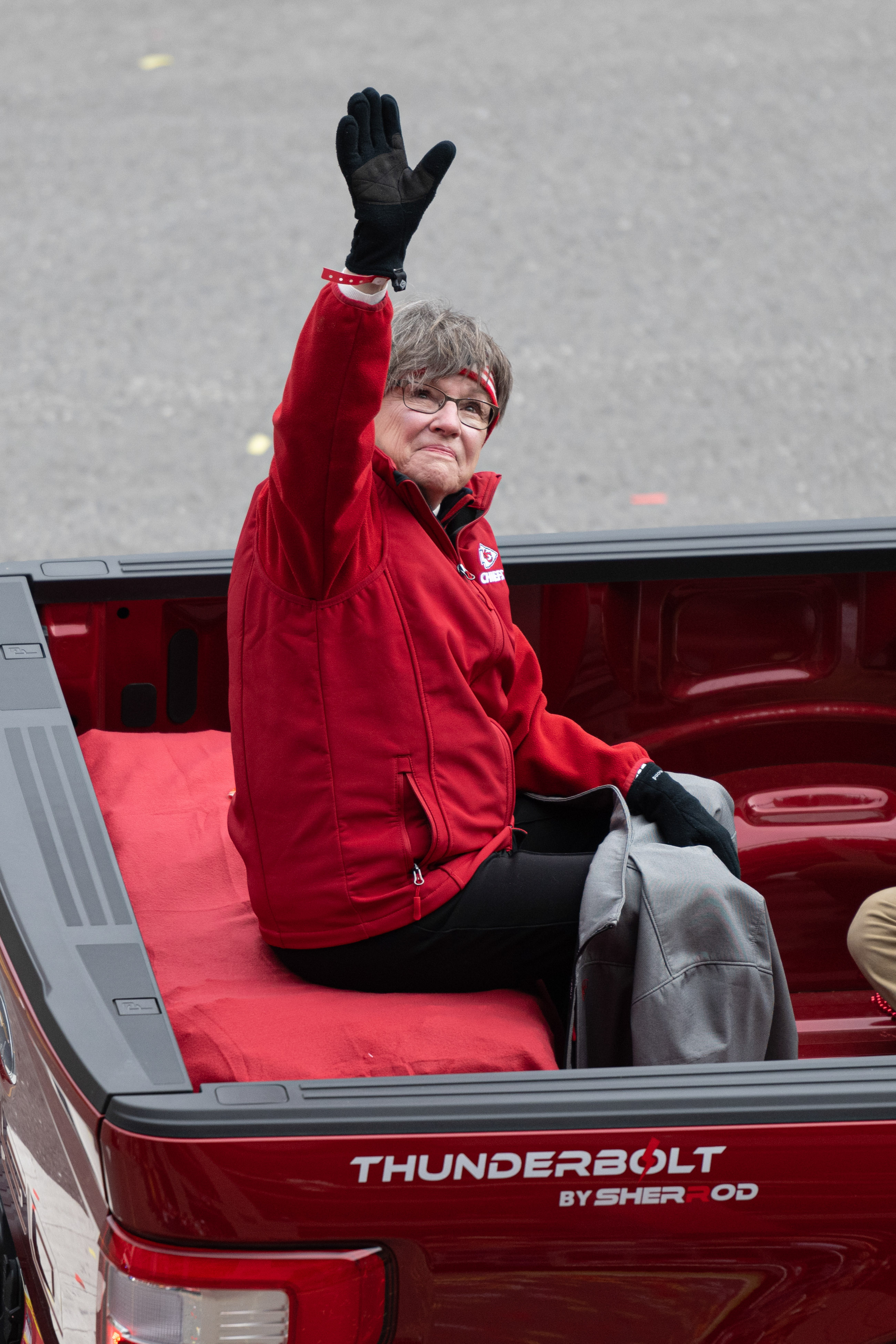 Feb 15, 2023; Kansas City, MO, USA; Kansas governor Laura Kelly rides along the route at the Super Bowl LVII Champions Parade in downtown Kansas City, Mo. Mandatory Credit: Amy Kontras-USA TODAY Sports