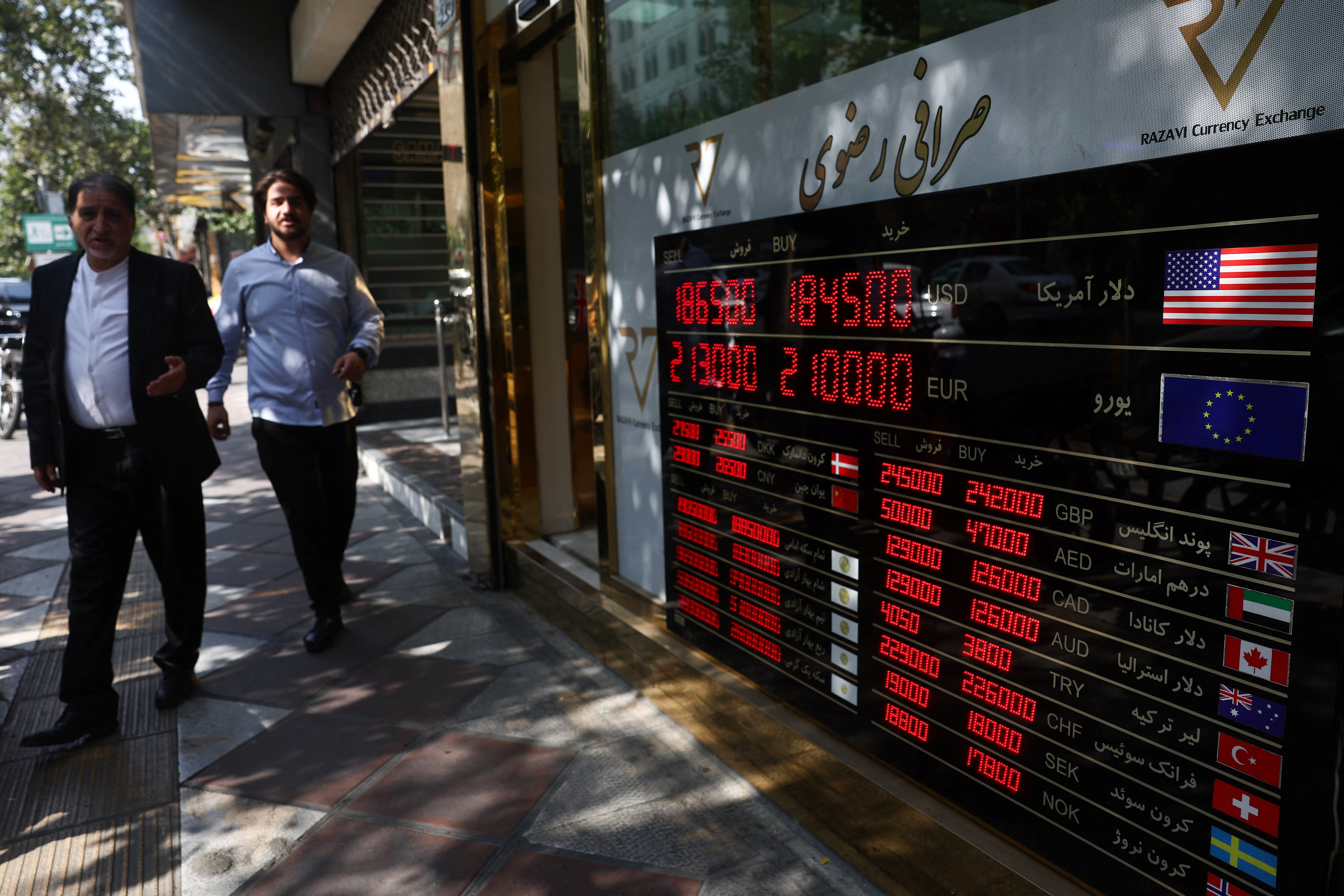A display shows currency exchange information, in the Grand Bazaar in Tehran, Iran, August 17, 2026. Majid Asgaripour/WANA (West Asia News Agency) via REUTERS ATTENTION EDITORS - THIS PICTURE WAS PROVIDED BY A THIRD PARTY. ISRAEL OUT. NO COMMERCIAL OR EDITORIAL SALES IN ISRAEL. NO ACCESS FOR ISRAELI MEDIA. NO USE BBC PERSIAN. NO USE VOA PERSIAN. NO USE MANOTO. NO USE IRAN INTERNATIONAL. NO USE RADIO FARDA. DIGITAL: NO USE BBC PERSIAN. NO USE VOA PERSIAN. NO USE MANOTO. NO USE IRAN INTERNATIONAL. NO USE RADIO FARDA.
