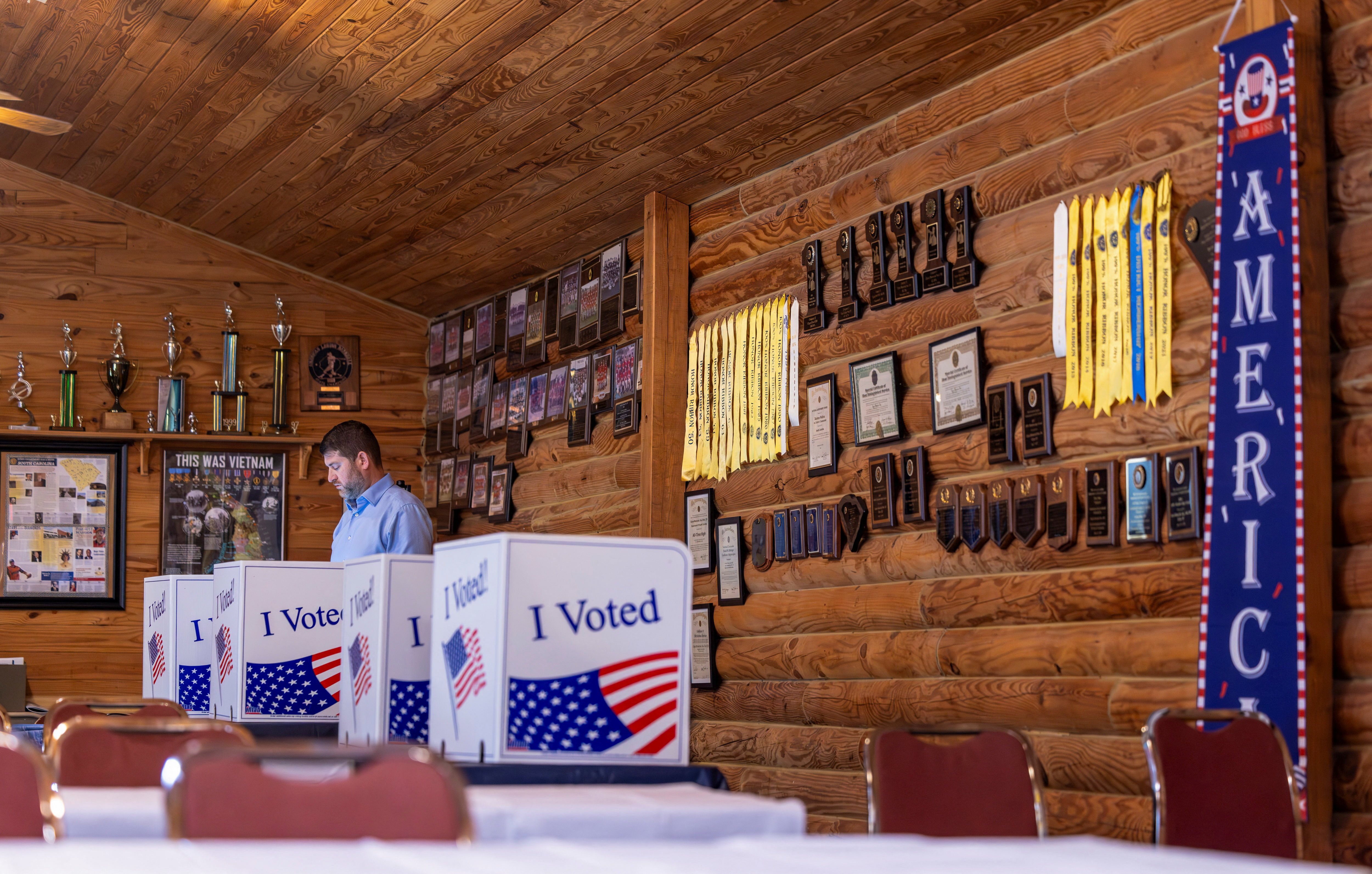 A voter casts his ballot at a polling station in a Republican primary runoff between U.S. Senator Darline Graham (R-SC) and U.S. Representative Ralph Norman (R-SC) for the U.S. Senate seat, in Cayce, Lexington County, South Carolina, U.S., August 25, 2026. REUTERS/Sam Wolfe