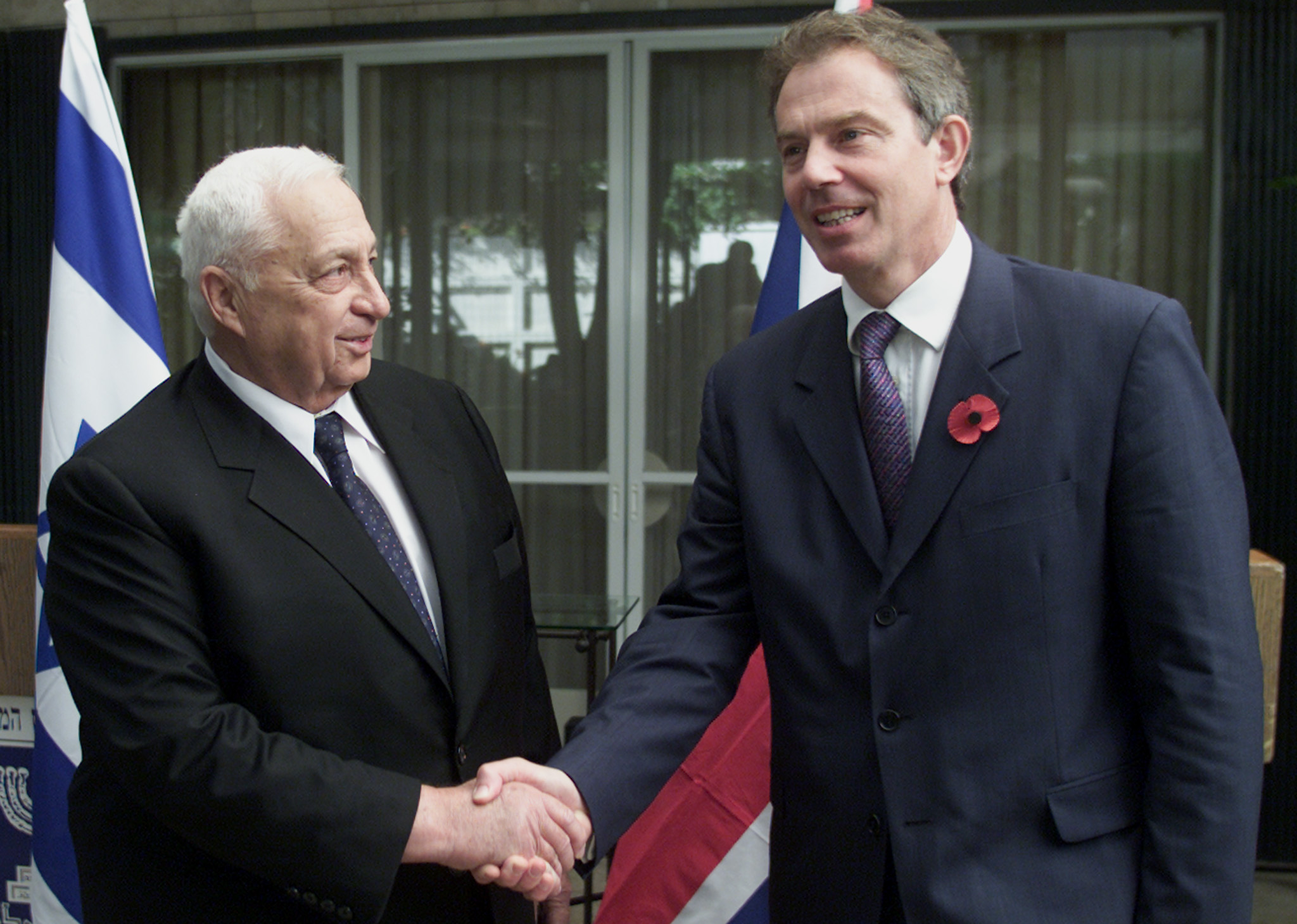 Israeli Prime Minister Ariel Sharon meets his British counterpart Tony Blair in Jerusalem November 1, 2001. [FILE: Natalie Behring/ Reuters]