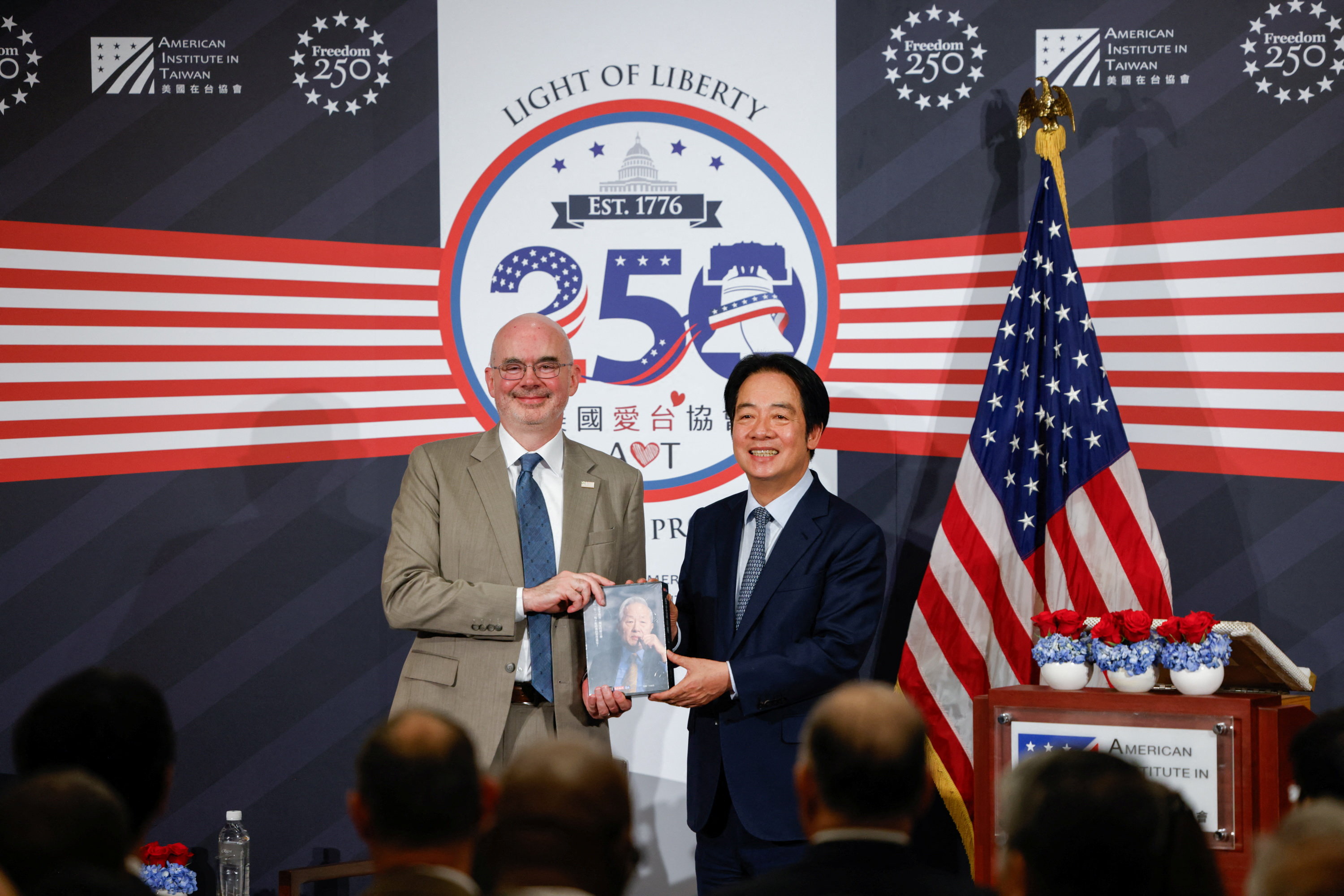 Taiwan's President Lai Ching-te and Director of the American Institute in Taiwan Raymond Greene pose for a photo at a reception in Taipei, Taiwan [File: Ann Wang/Reuters]