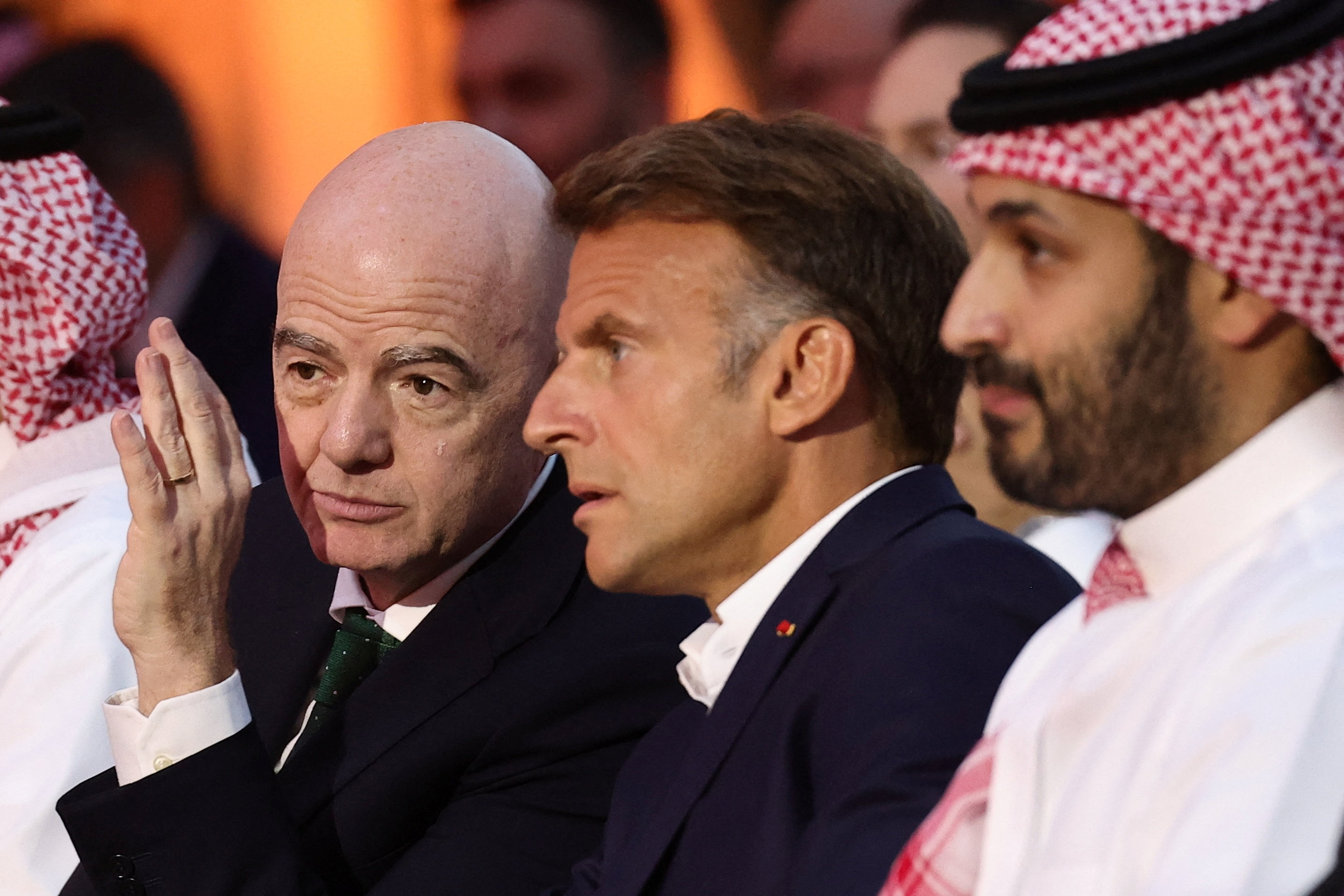 President of FIFA Gianni Infantino, French President Emmanuel Macron and Saudi Crown Prince Mohammed bin Salman