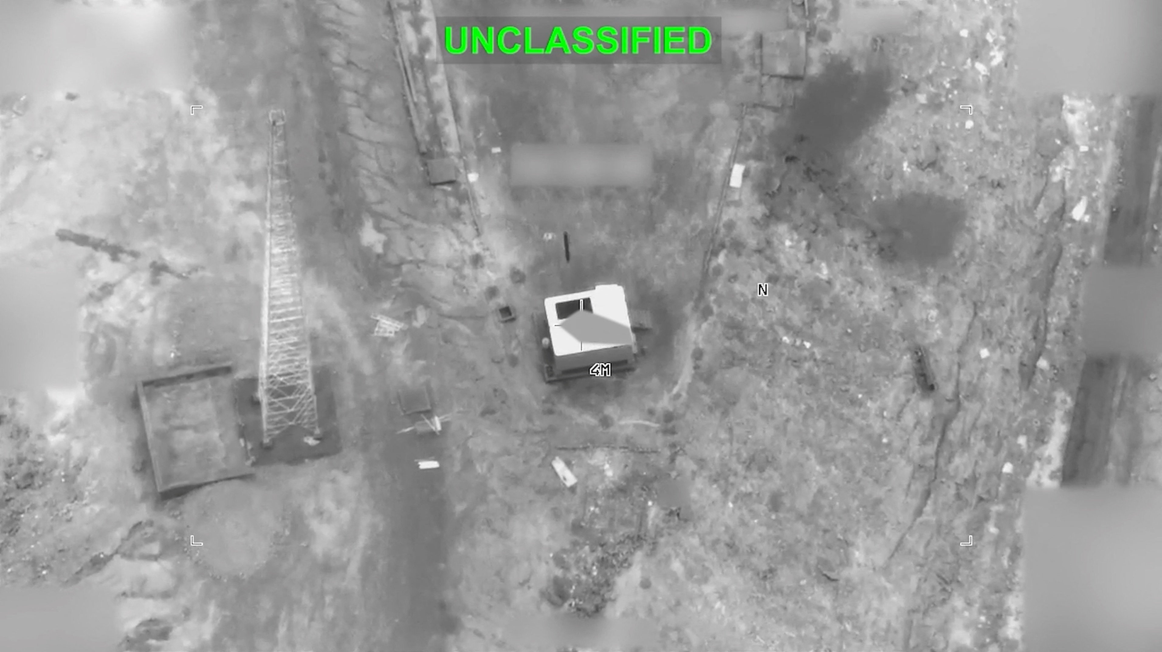 A screengrab shows a building and the ground around it.