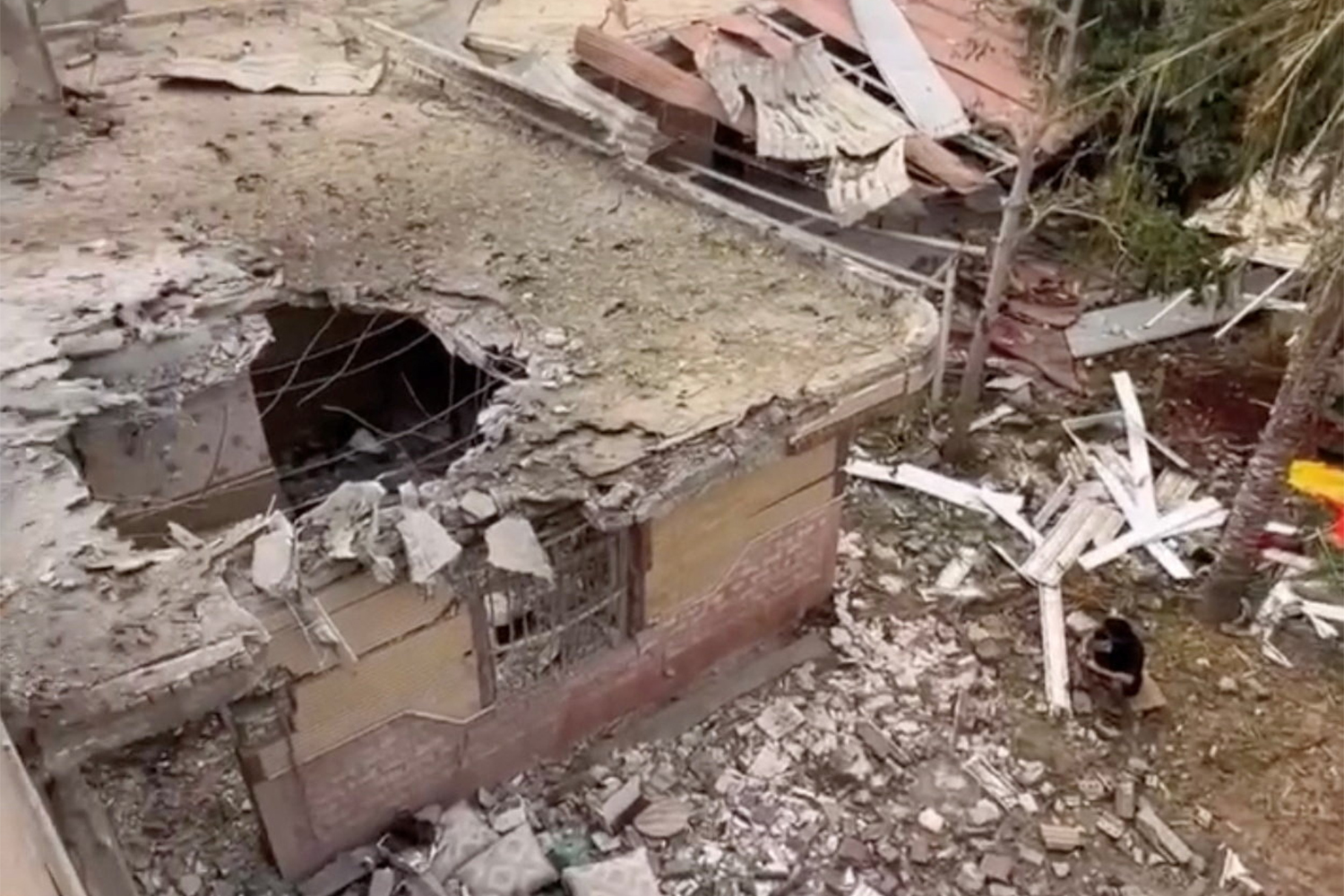 Rubble lies around damaged houses following a reported attack near a wedding gathering in Kuhistik, Sirik, Iran, September 2, 2026 in this screengrab taken from a handout video . Iranian Red Crescent Society/Handout via REUTERS THIS IMAGE HAS BEEN SUPPLIED BY A THIRD PARTY. NO RESALES. NO ARCHIVES. MANDATORY CREDIT. VERIFICATION: -Building layout, roof and trees matched satellite images -Date confirmed by official and media reports of the attack -Iranian state media reported multiple casualties at wedding near Sirik after the attack on Tuesday evening