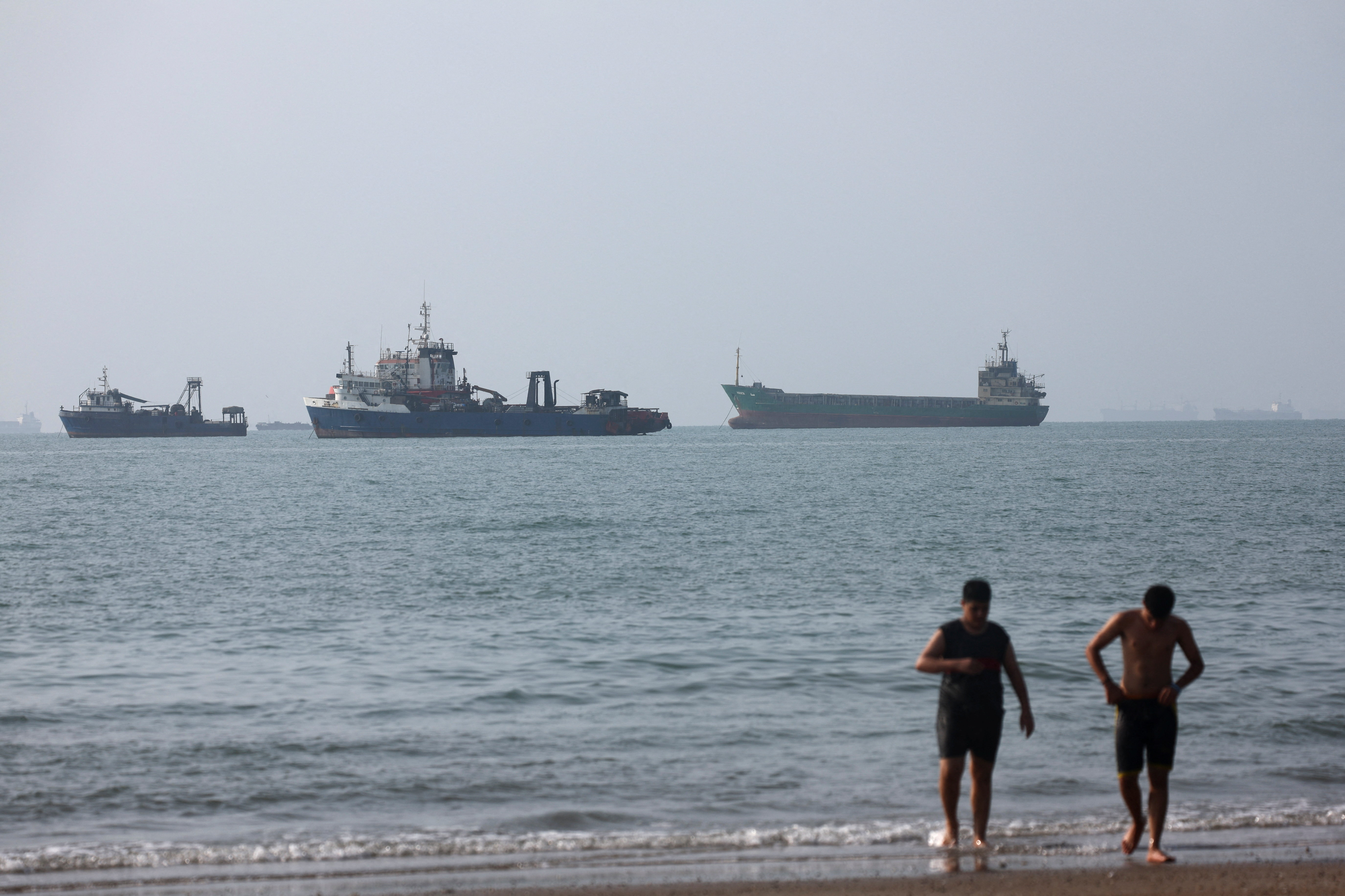 Vessels in the Strait of Hormuz near the beach of Bandar Abbas, Iran, September 5, 2026. [Majid Asgaripour/WANA via Reuters]