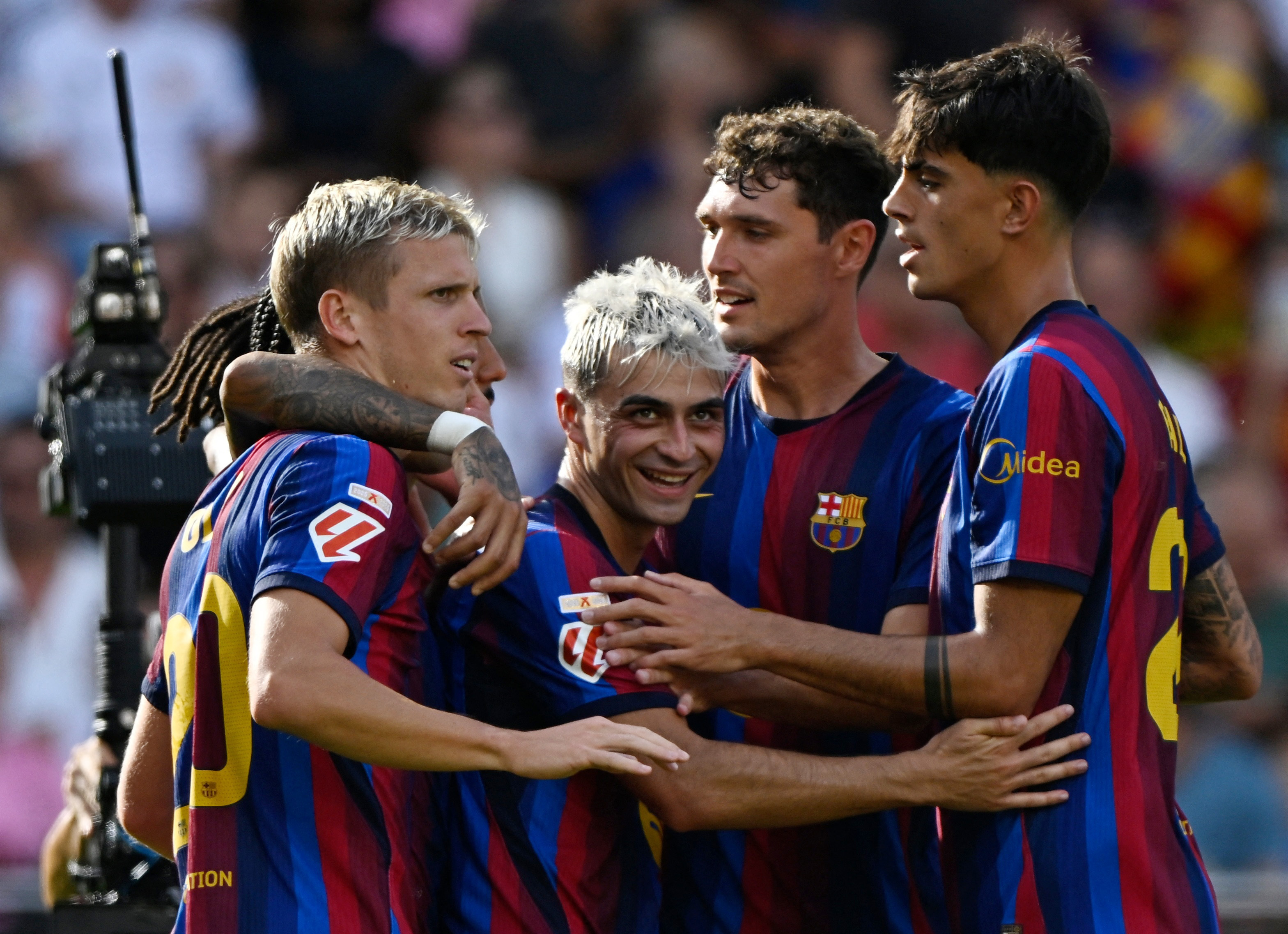 Barcelona's Pedri celebrates scoring their fourth goal with teammates