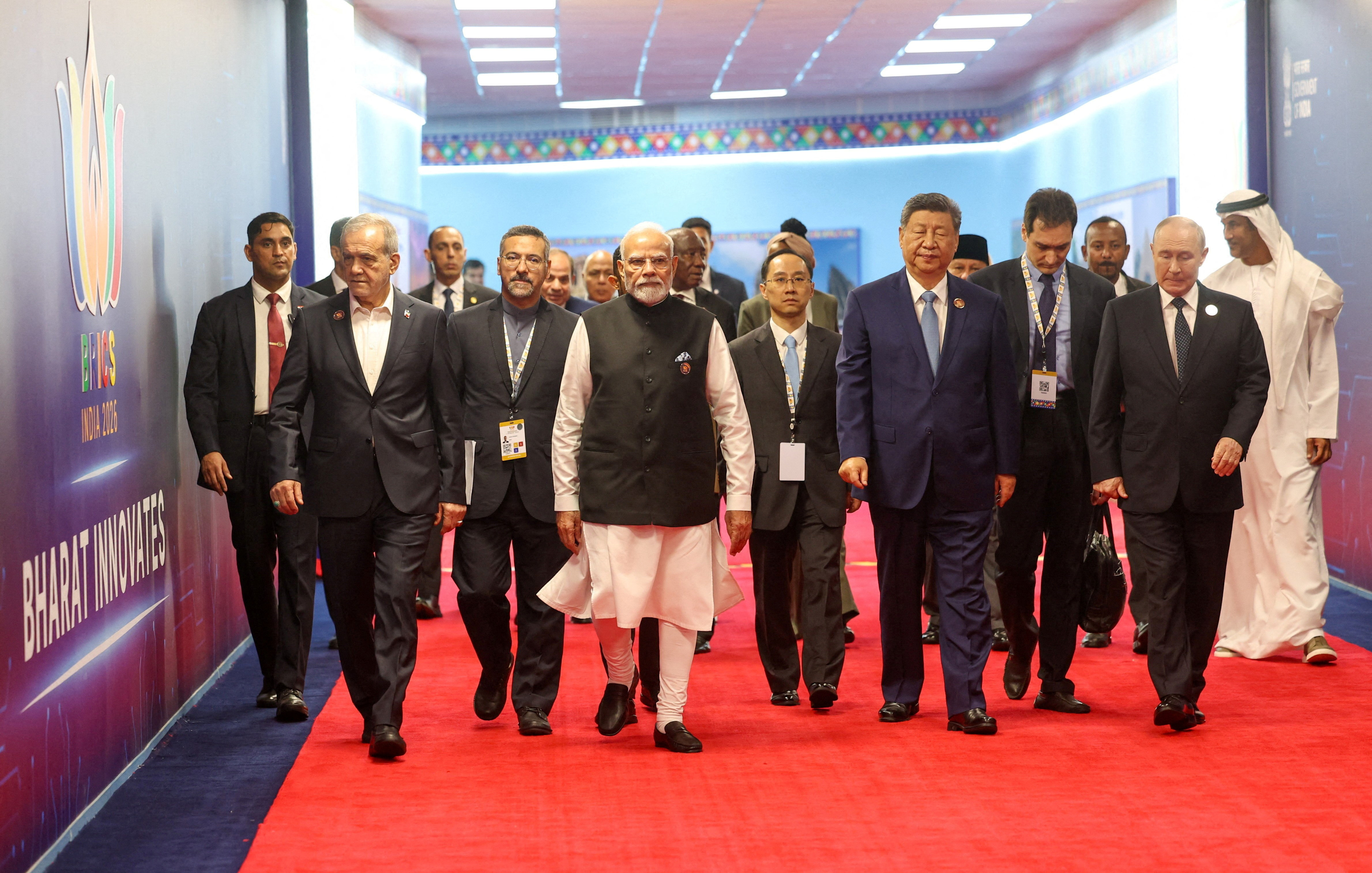 India's Prime Minister Narendra Modi walks with Russian President Vladimir Putin, Chinese President Xi Jinping and Iranian President Masoud Pezeshkian at the venue of BRICS Summit in New Delhi on September 12, 2026 [India's Press Information Bureau/Reuters]