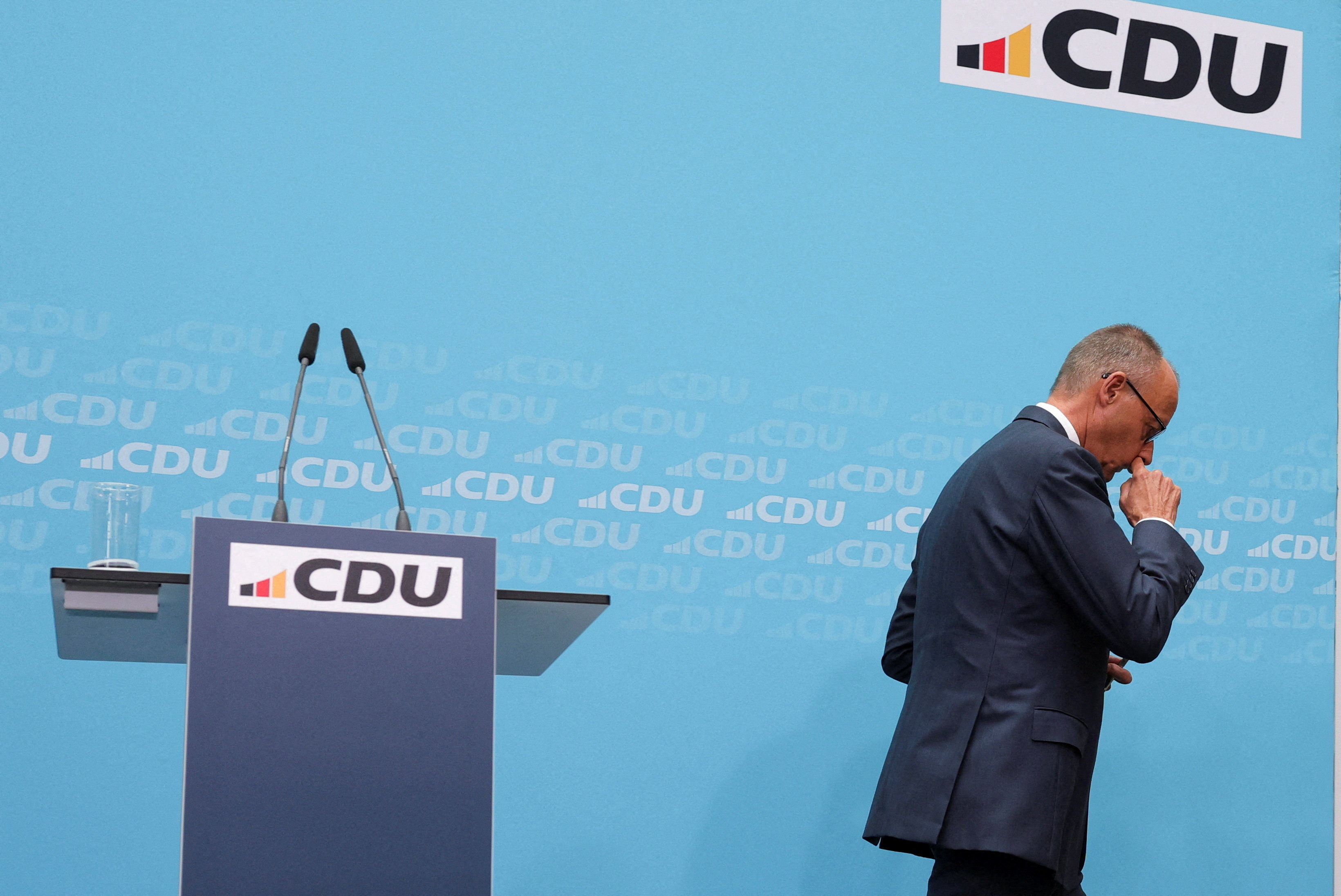 German Chancellor and Christian Democratic Union (CDU) party leader, Friedrich Merz leaves after a news conference, following state elections, in Berlin, Germany, September 21, 2026. REUTERS/Fabrizio Bensch TPX IMAGES OF THE DAY
