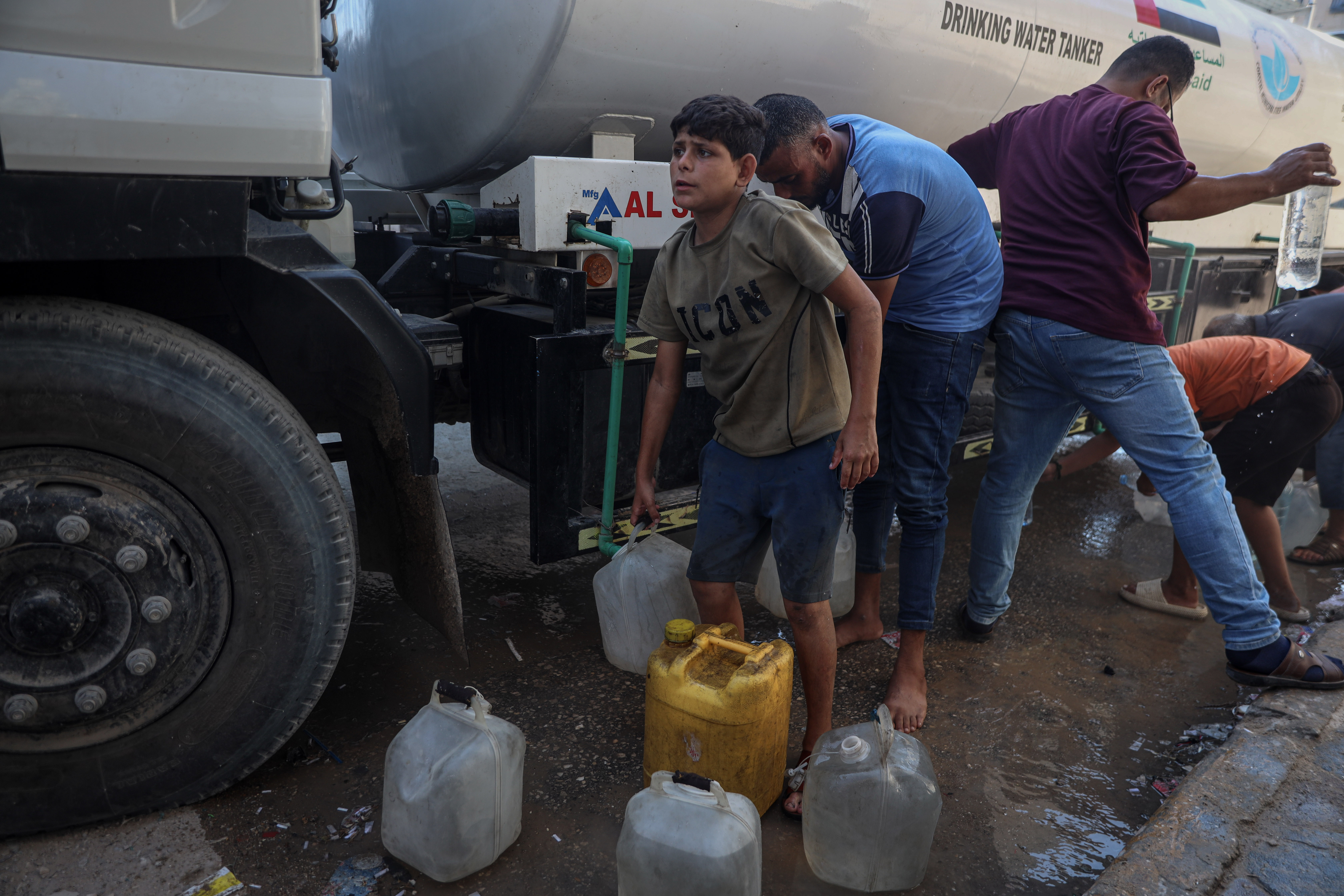 Many Palestinians in Gaza are forced to rely on infrequent water trucks