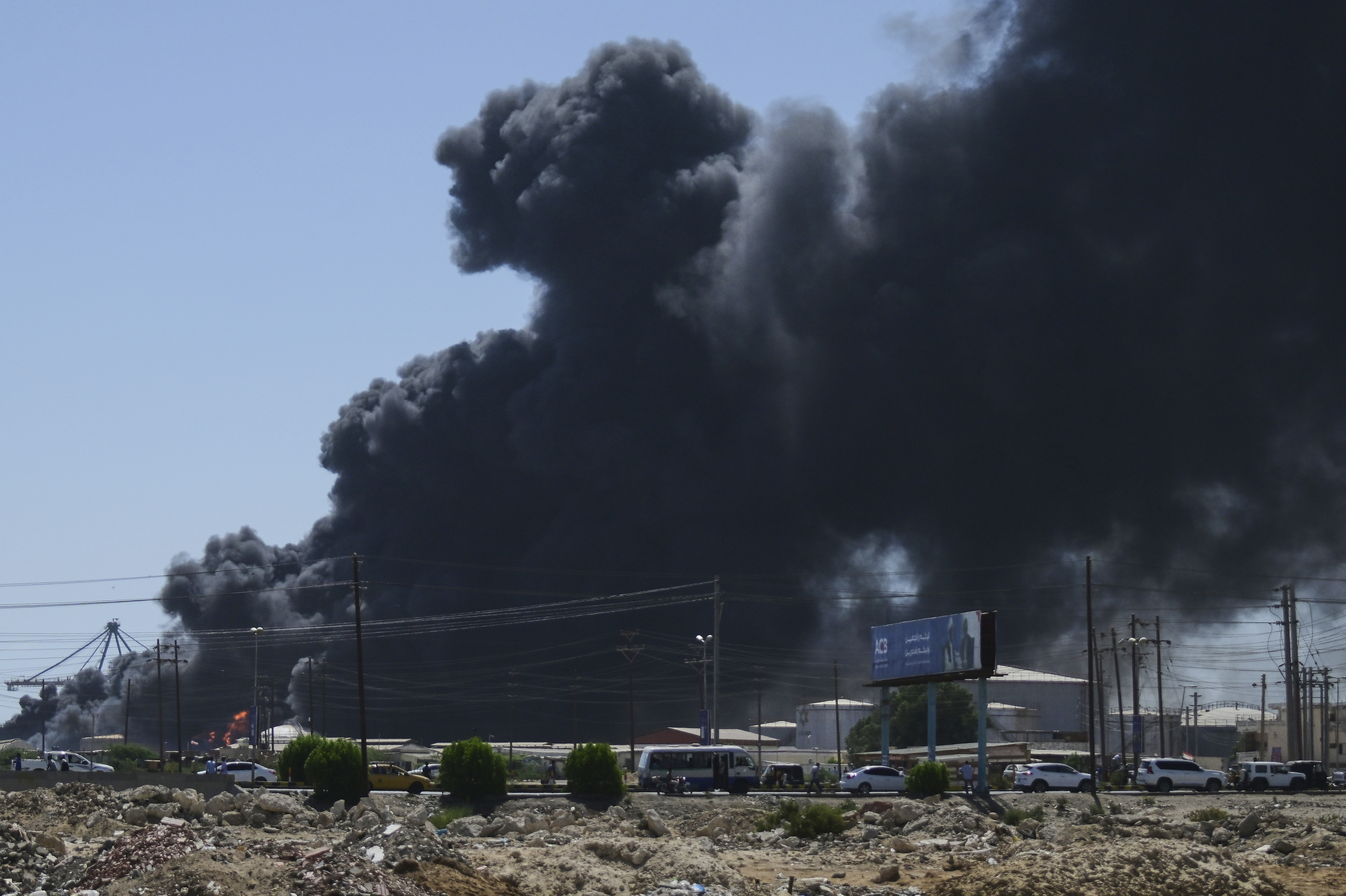 FILE - Smoke billows after drone strikes by the paramilitary Rapid Support Forces (RSF) targeted the northern port in the Red Sea city of Port Sudan, Sudan, May 6, 2025. (AP Photo, File)