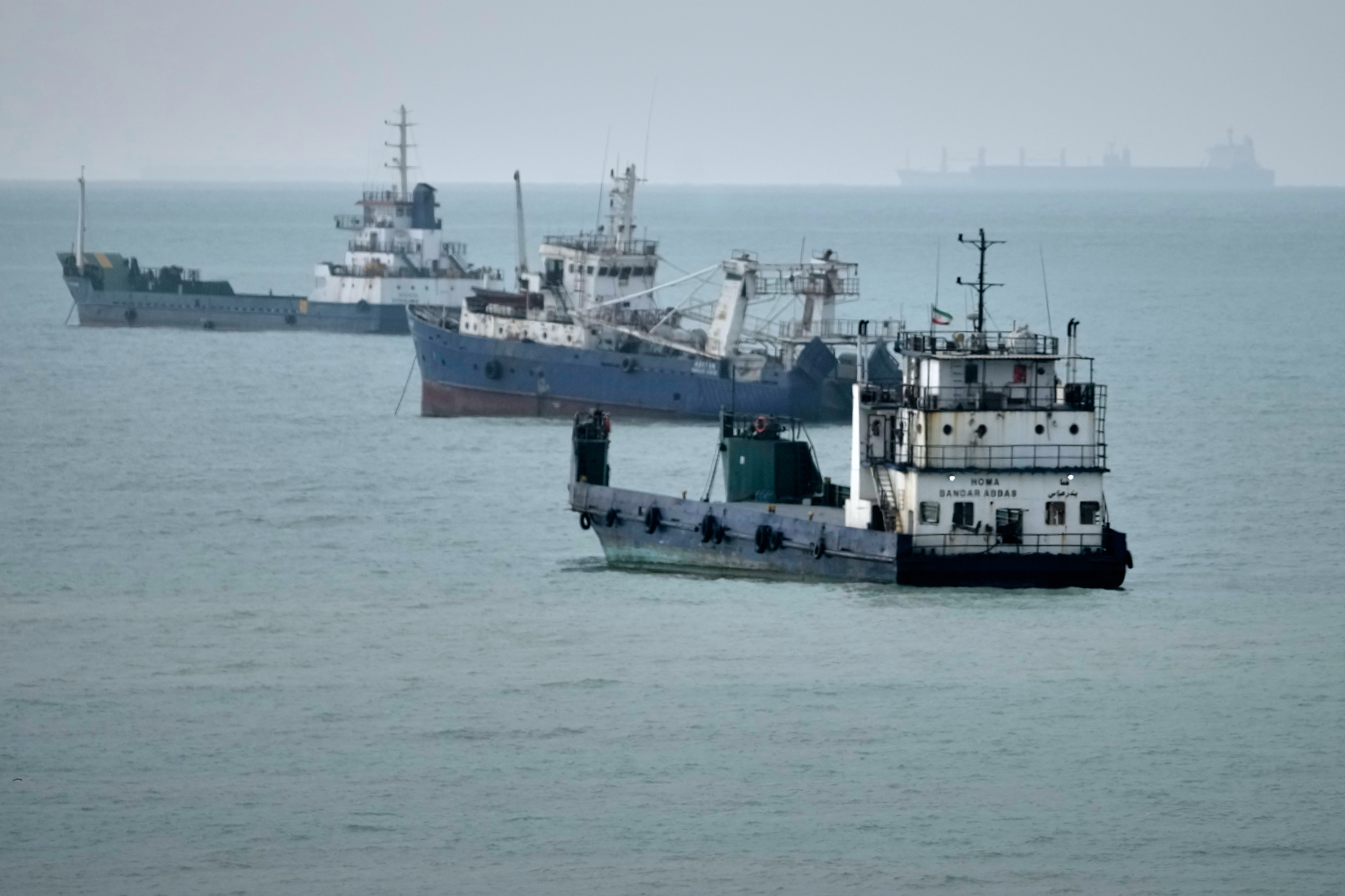 Commercial vessels lie anchored in the Strait of Hormuz off Bandar Abbas, Iran, Friday, Sept. 4, 2026. (AP Photo/Vahid Salemi)