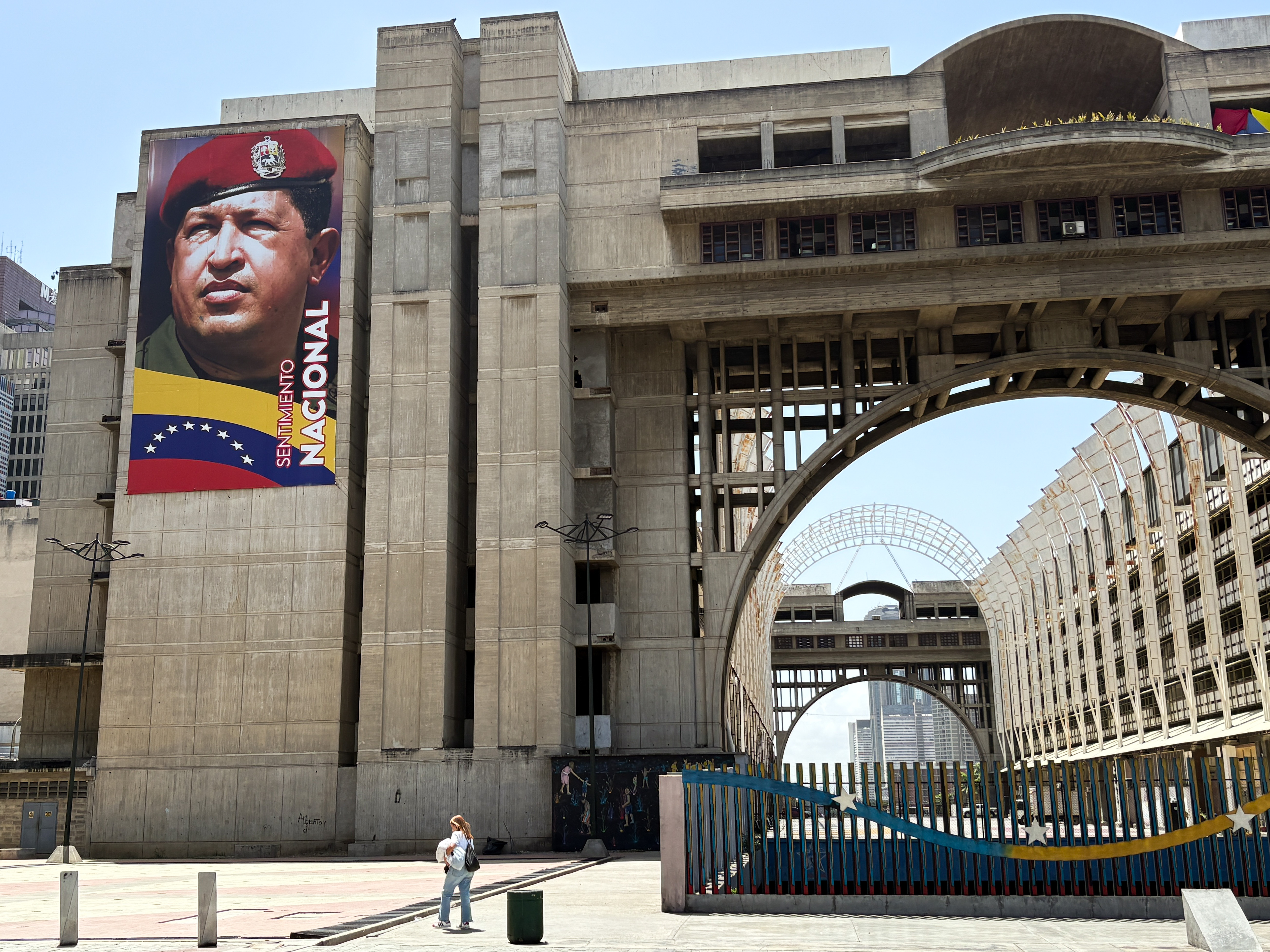 A portrait of Hugo Chavez formerly visible on the Palace of Justice in Caracas, Venezuela, has since been covered up