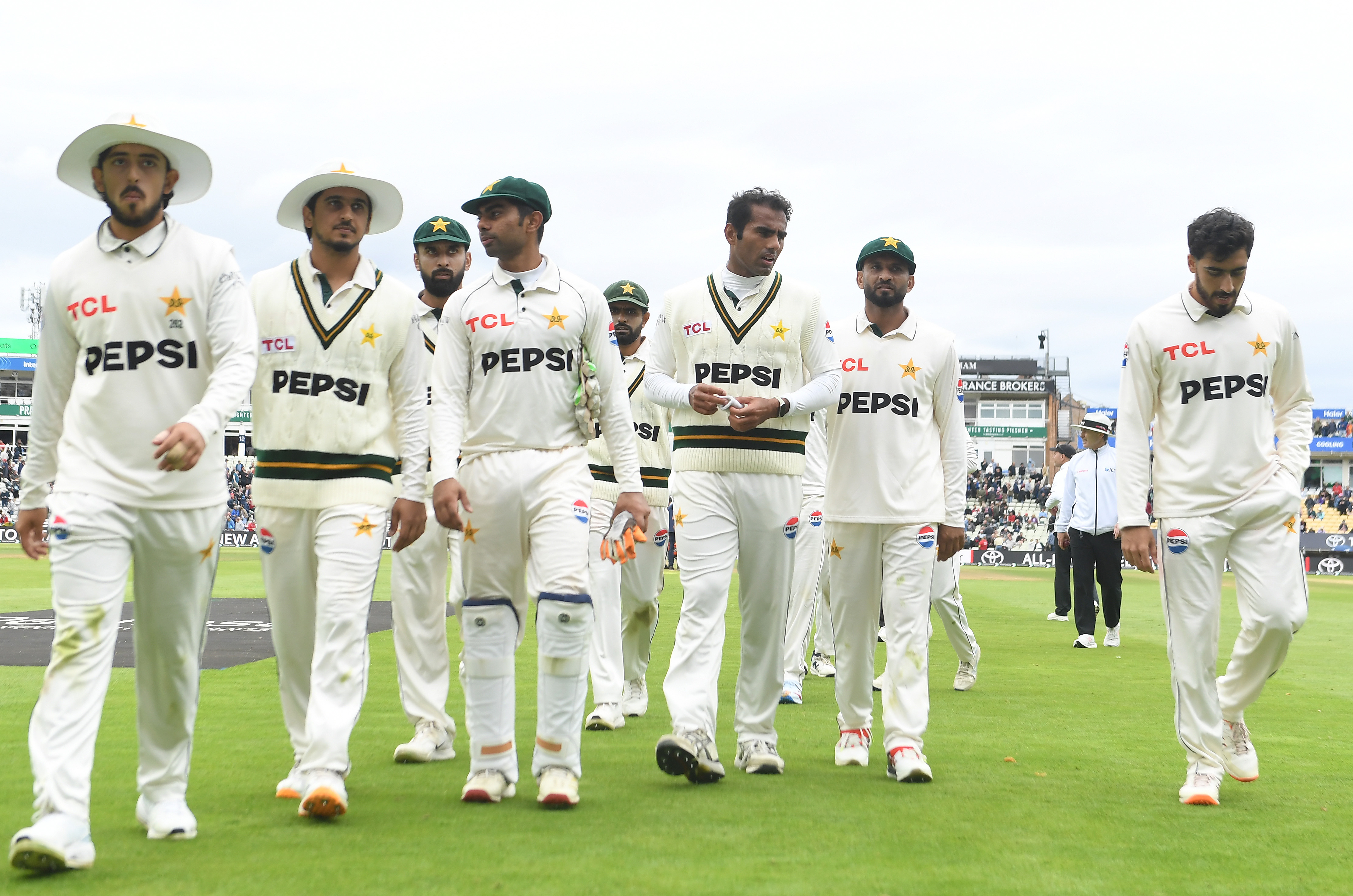 BIRMINGHAM, ENGLAND - SEPTEMBER 10: The Pakistan team leave the field after bowling out England during the second day of the third Rothesay Test between England and Pakistan at Edgbaston on September 10, 2026 in Birmingham, England. (Photo by Philip Brown/Getty Images)