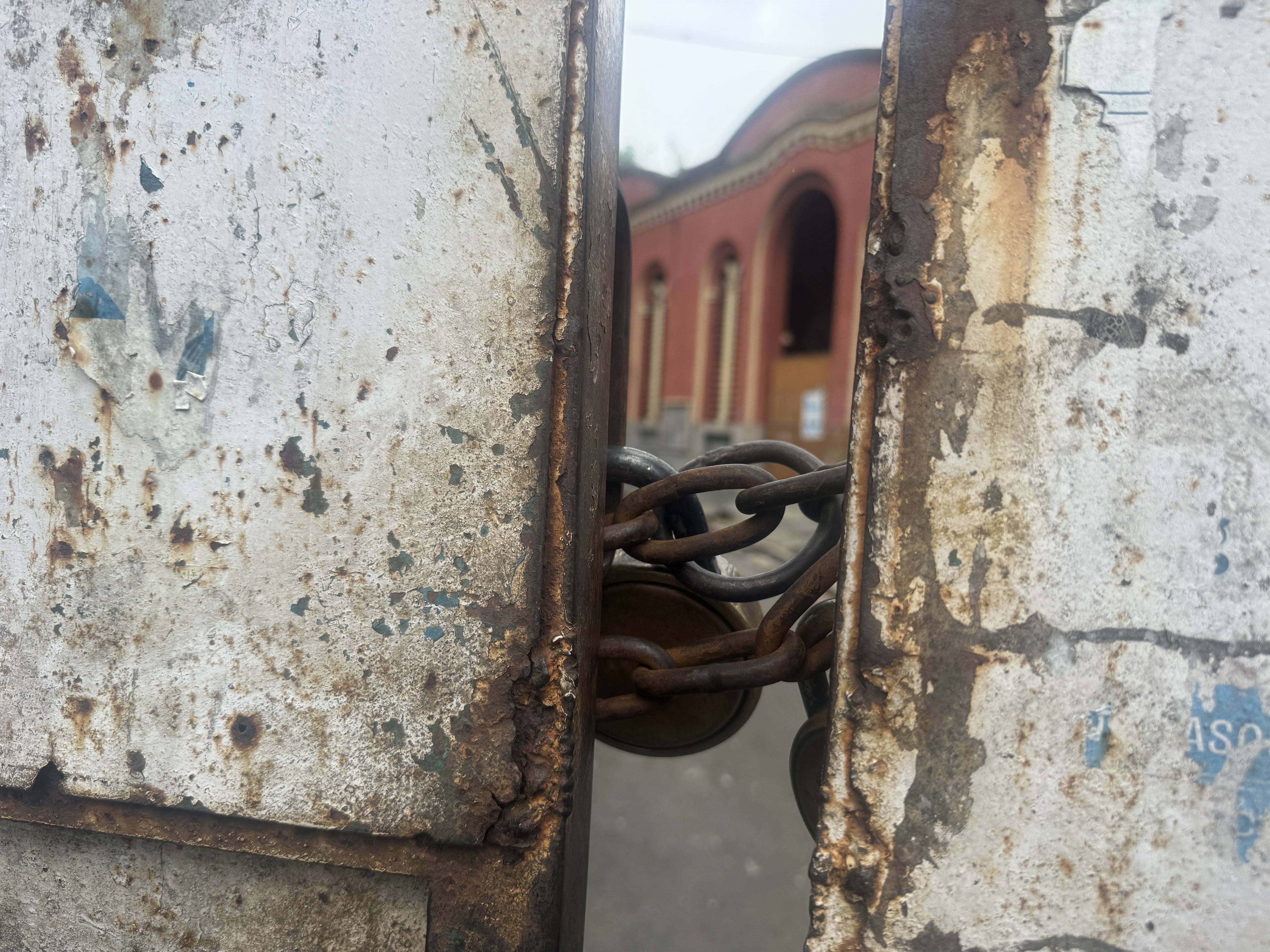 The locked entrance to the Tangra slaughterhouse in Kolkata, India [Arshia/ Al Jazeera]