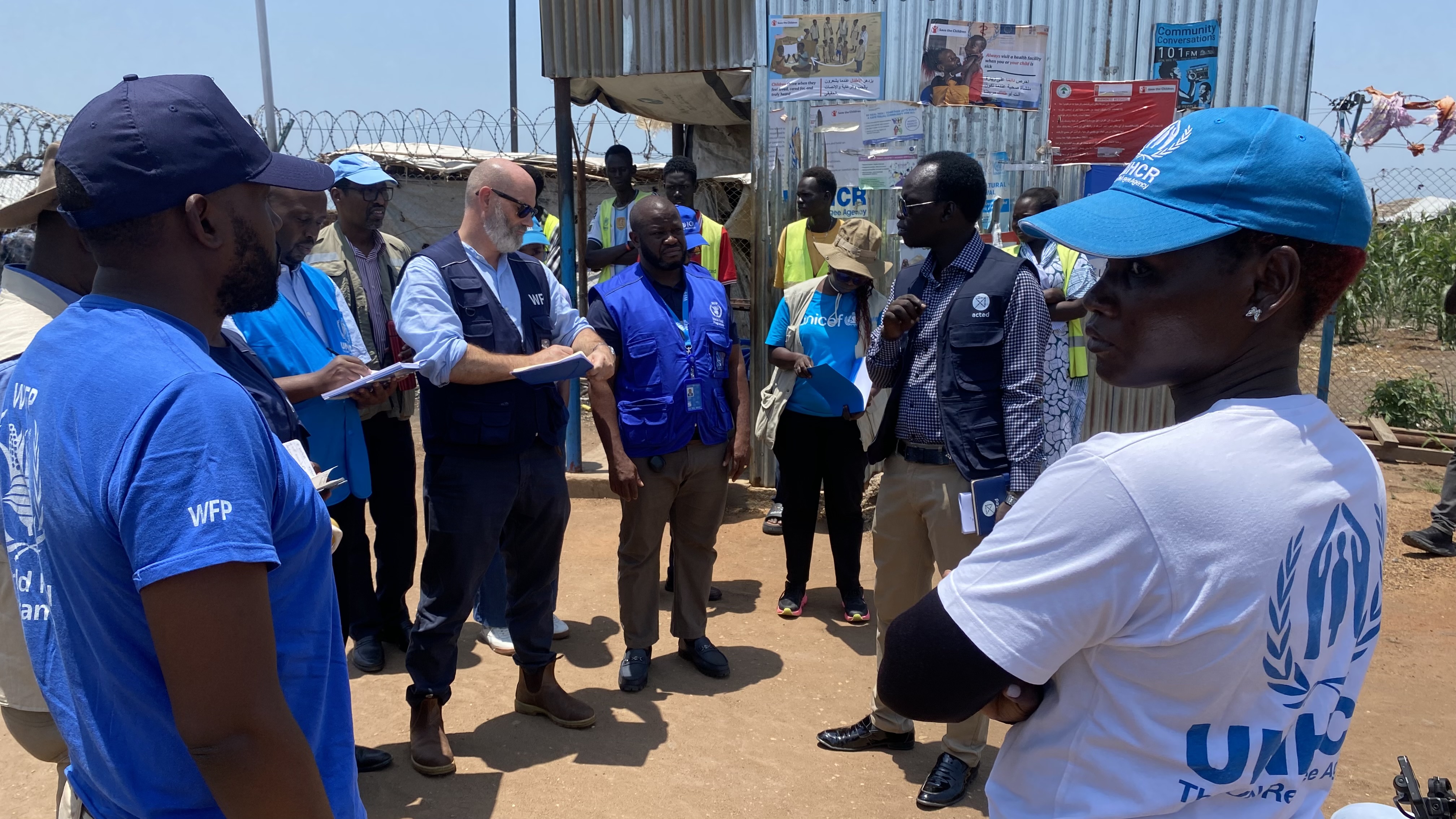 WFP Assistant Executive Director Matthew Hollingworth joins a delegation of UN and humanitarian partners for a group photo in Renk, South Sudan, during a visit to assess the humanitarian situation.