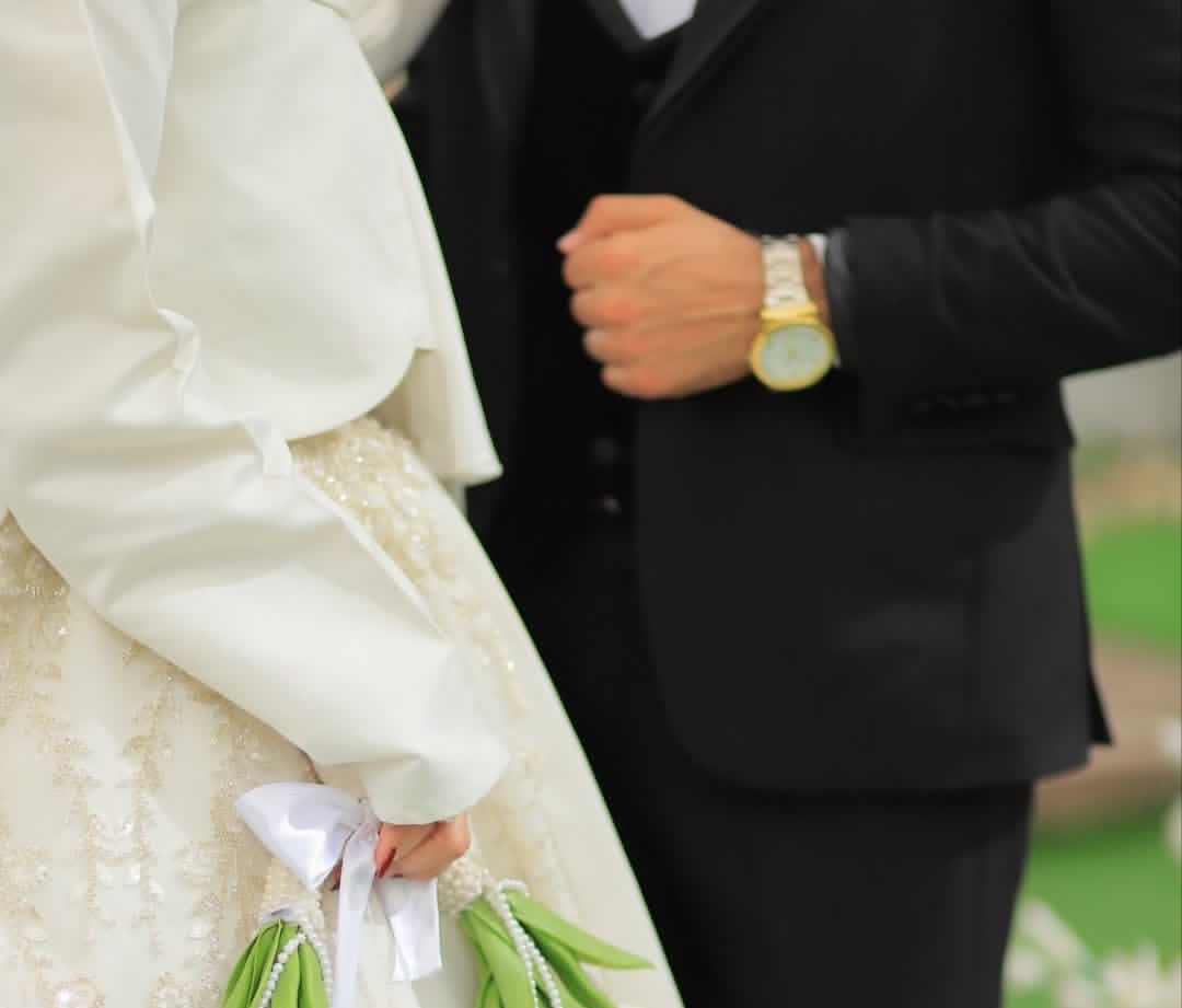 The writer and her groom on their wedding day, September 2, 2026 [Alaa Dmeida/Al Jazeera]
