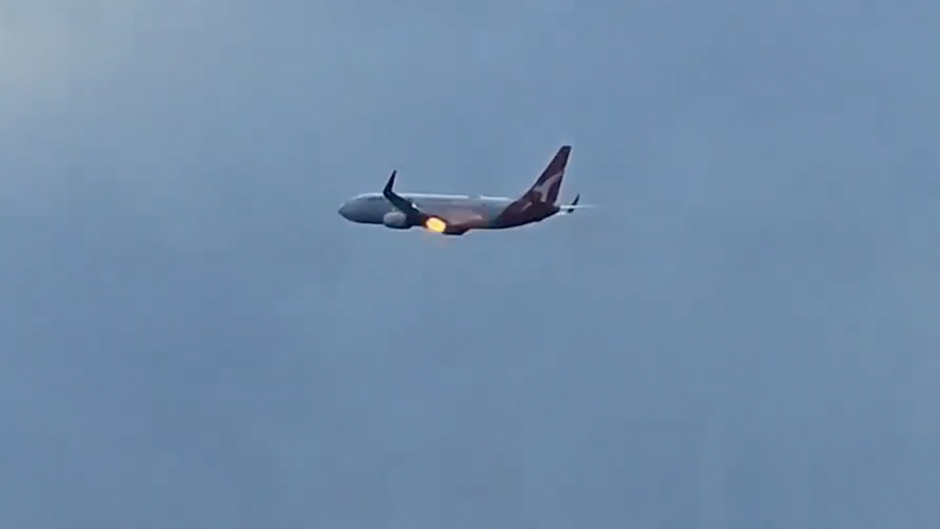 Flames burst from Qantas plane engine after New Zealand takeoff