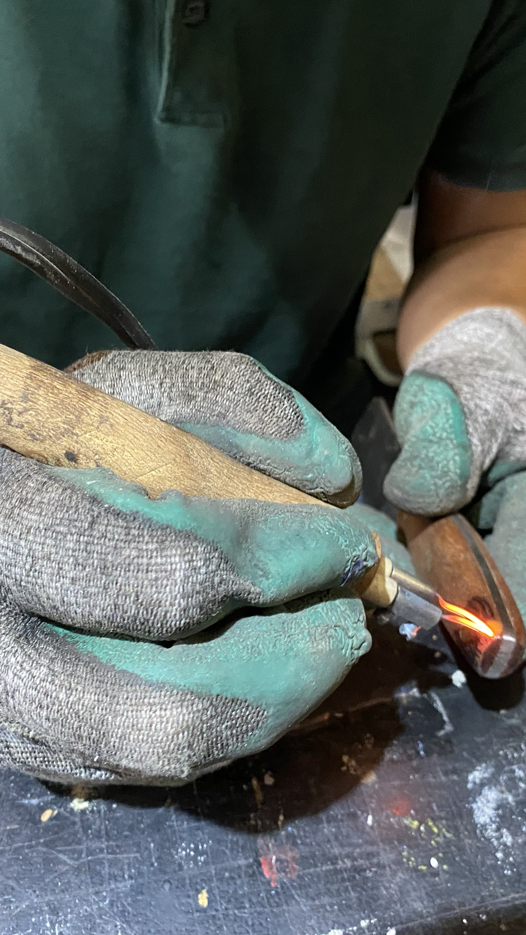 Yagiz Can Sonmez works on a piece at the Akdemir forge. He describes blacksmithing as a process of projecting “what’s in your mind and soul onto a hard metal”