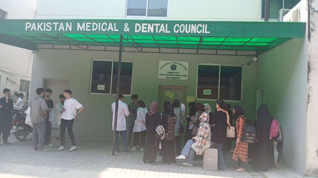 Some Afghan students gathered outside the Pakistan Medical & Dental Council office in Lahore to inquire about their status following the expulsion notification from the organisation. [Courtesy Alishba]