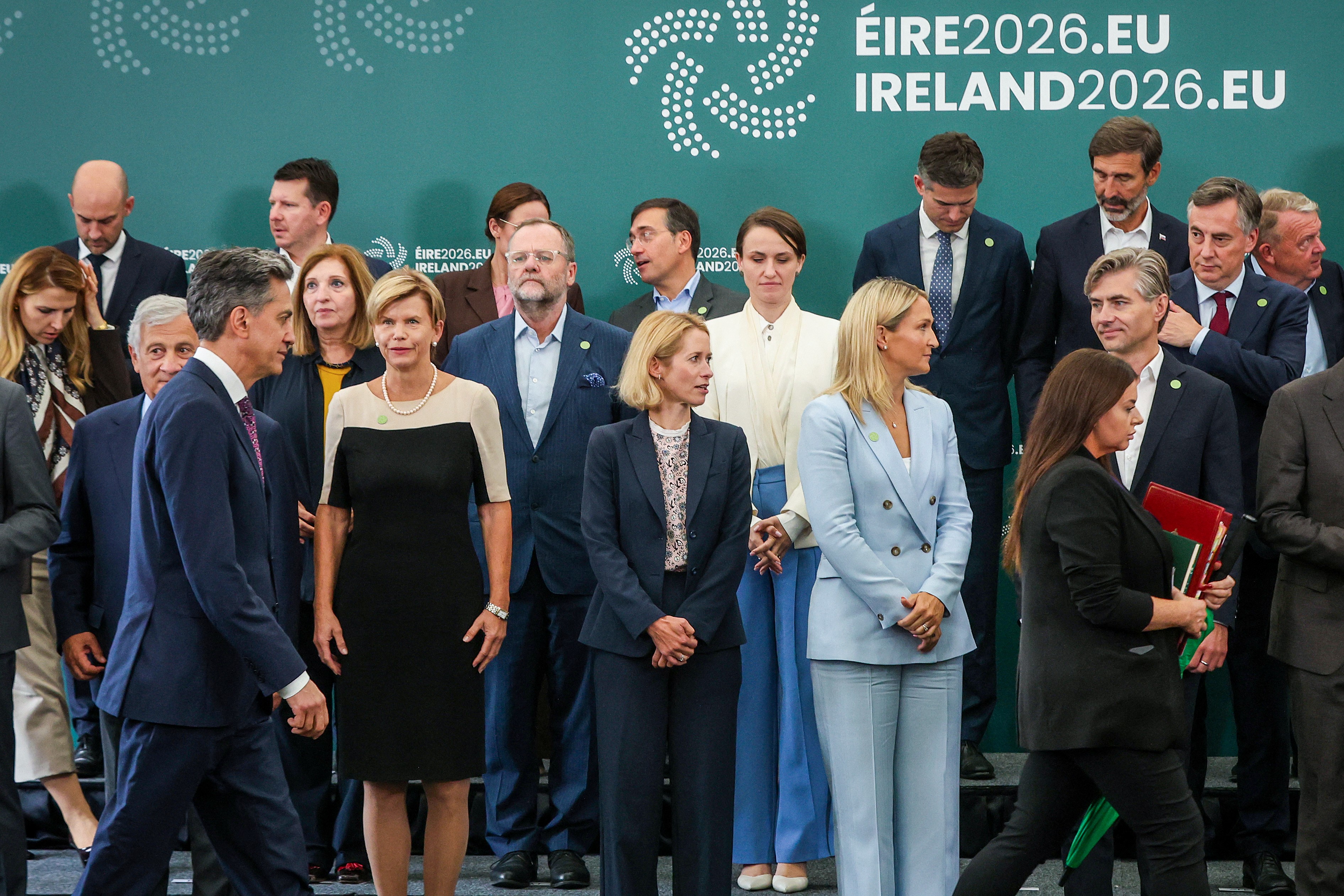 Britain's Foreign Minister Ed Miliband (front L) walks past European Commission High Representative and Vice President Kaja Kallas (C-front) and Ireland's Defence and Foreign Minister Helen McEntee (3rd R-front) after posing for a group photo with other visiting EU foreign affairs ministers during their informal meeting. [AFP]