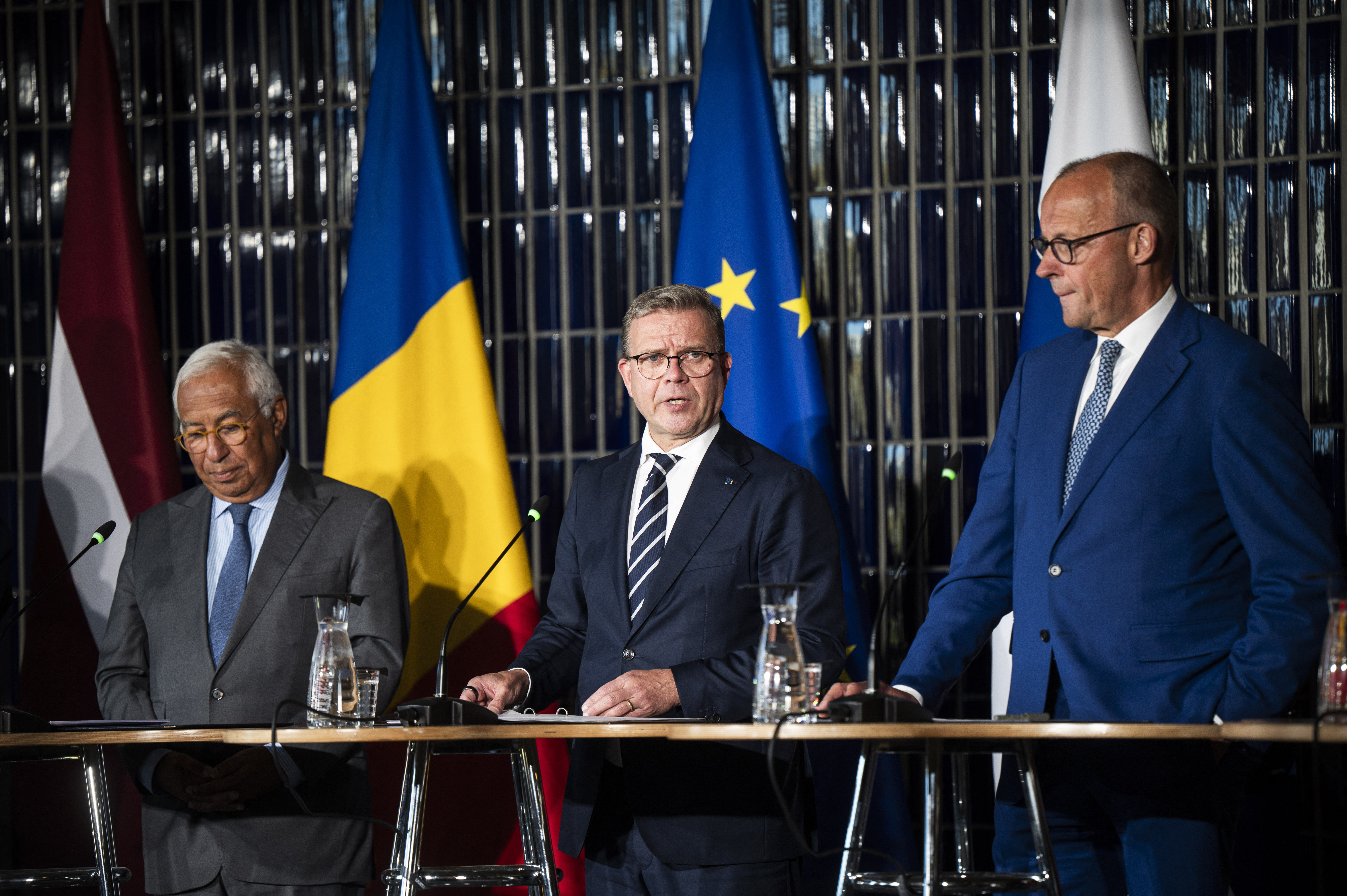 (L-R) President of the European Council Antonio Costa, Finland's Prime Minister Petteri Orpo and German Chancellor Friedrich Merz hold a joint leaders' press conference during the European Arctic Summit on September 14, 2026 at the Arktikum Science Centre in Rovaniemi, Finland.