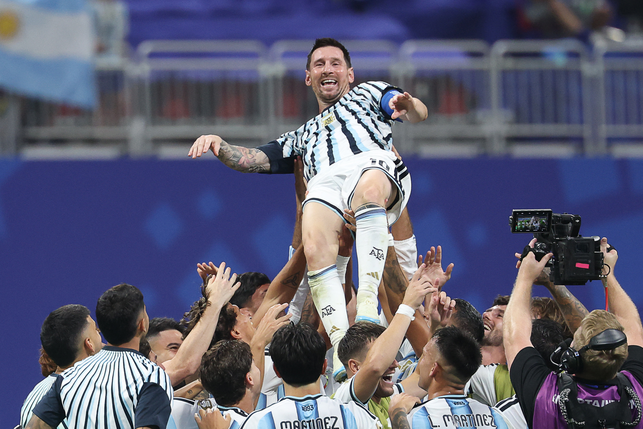 (FILES) Argentina's forward #10 Lionel Messi is lifted by teammates as they celebrate after winning the 2026 World Cup round of 16 football match between Argentina and Egypt at Atlanta Stadium in Atlanta on July 7, 2026.