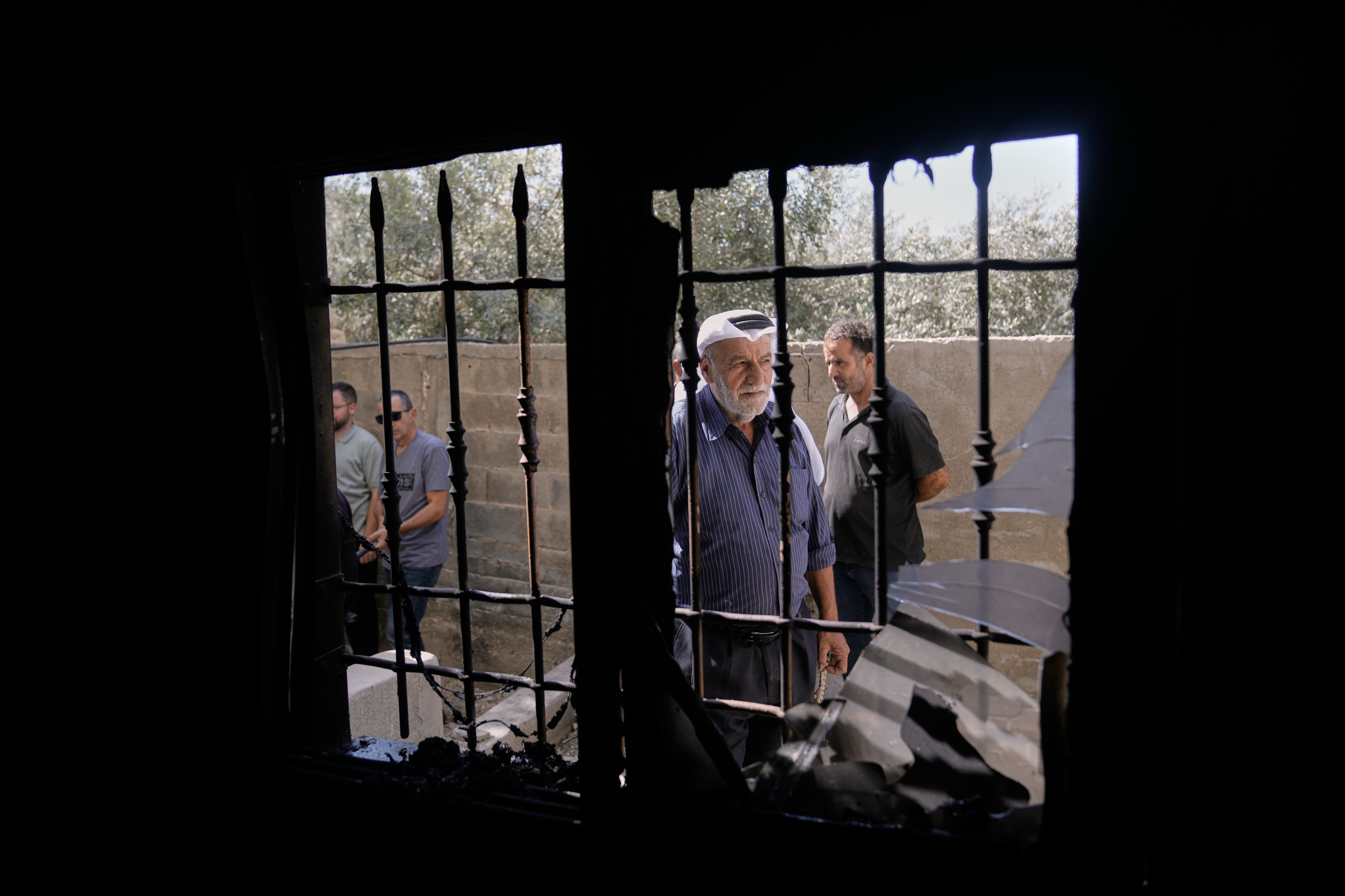 Palestinians check the damage to a mosque that, according to residents, was burned during an attack by Israeli settlers, in the West Bank village of Bazariya, Tuesday, Sept. 1, 2026 (AP Photo/Majdi Mohammed)