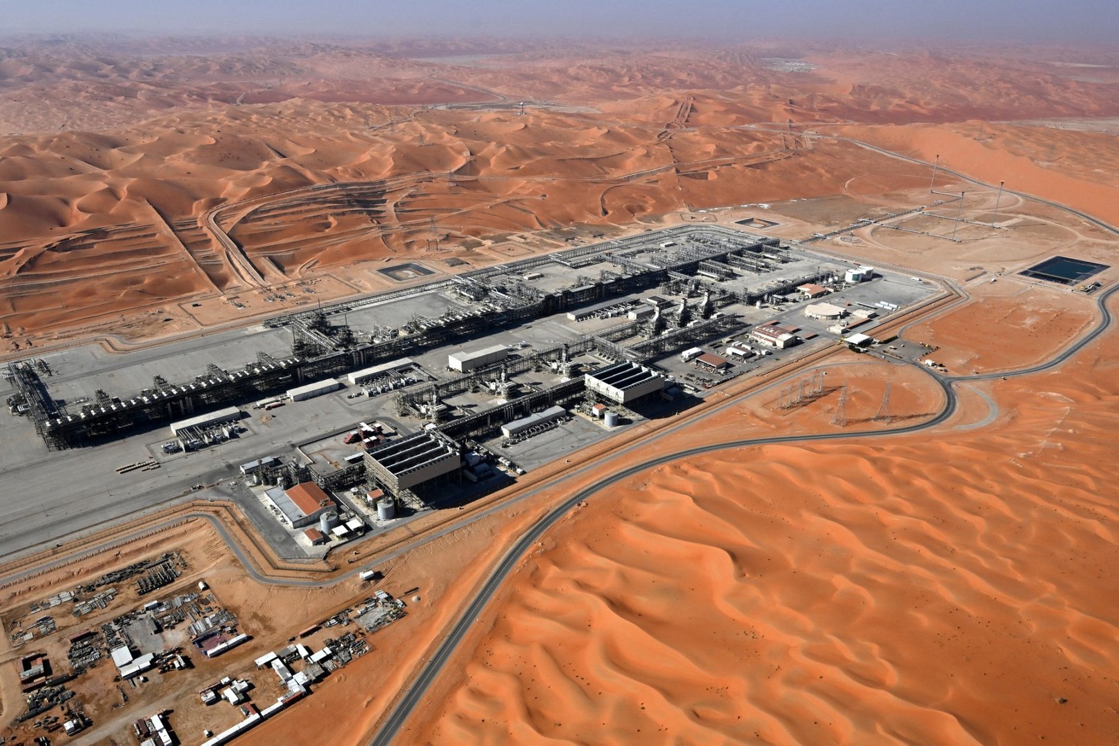 This photograph taken on January 12, 2024, shows an oil refinery in the desert between Shubaytah and Shubaytah in Saudi Arabia, on January 12, 2024. [Photo by PATRICK HERTZOG / AFP]